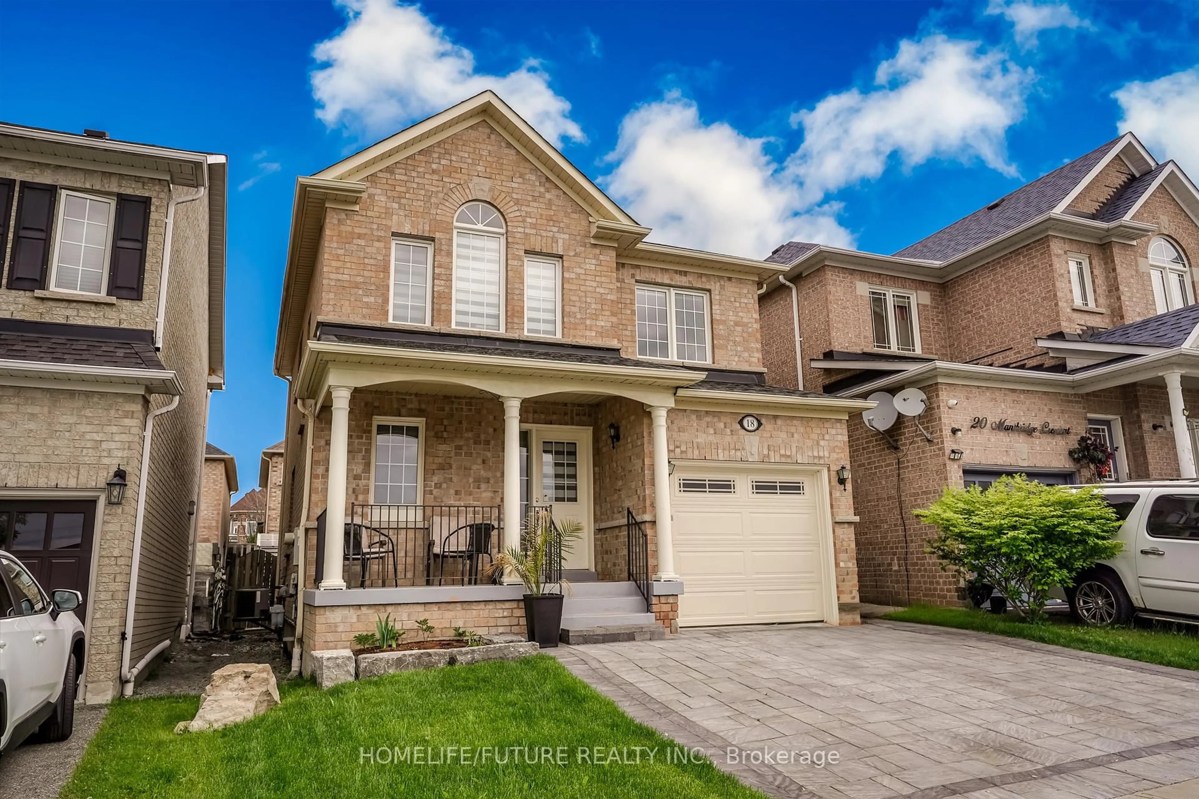 Home with brick exterior material, street for 18 Mansbridge Cres, Ajax Ontario L1Z 1S3