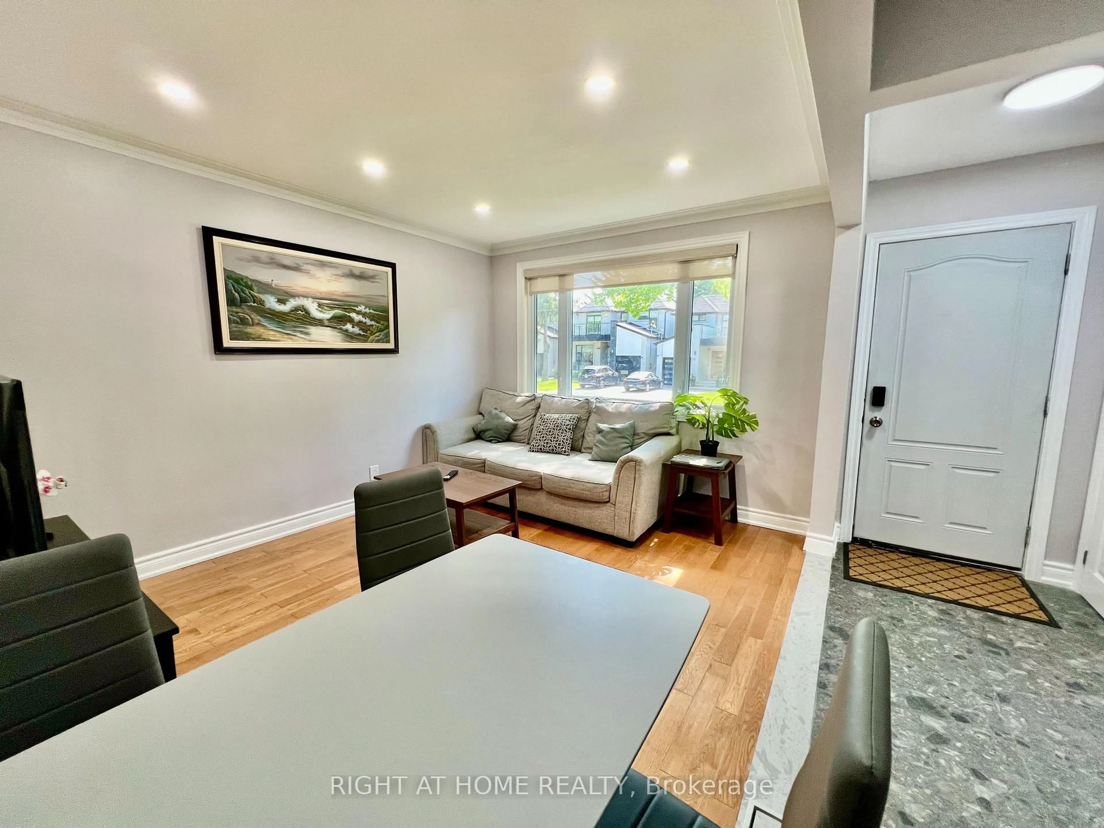 Living room with furniture, wood/laminate floor for 133 Brooklawn Ave, Toronto Ontario M1M 2P8