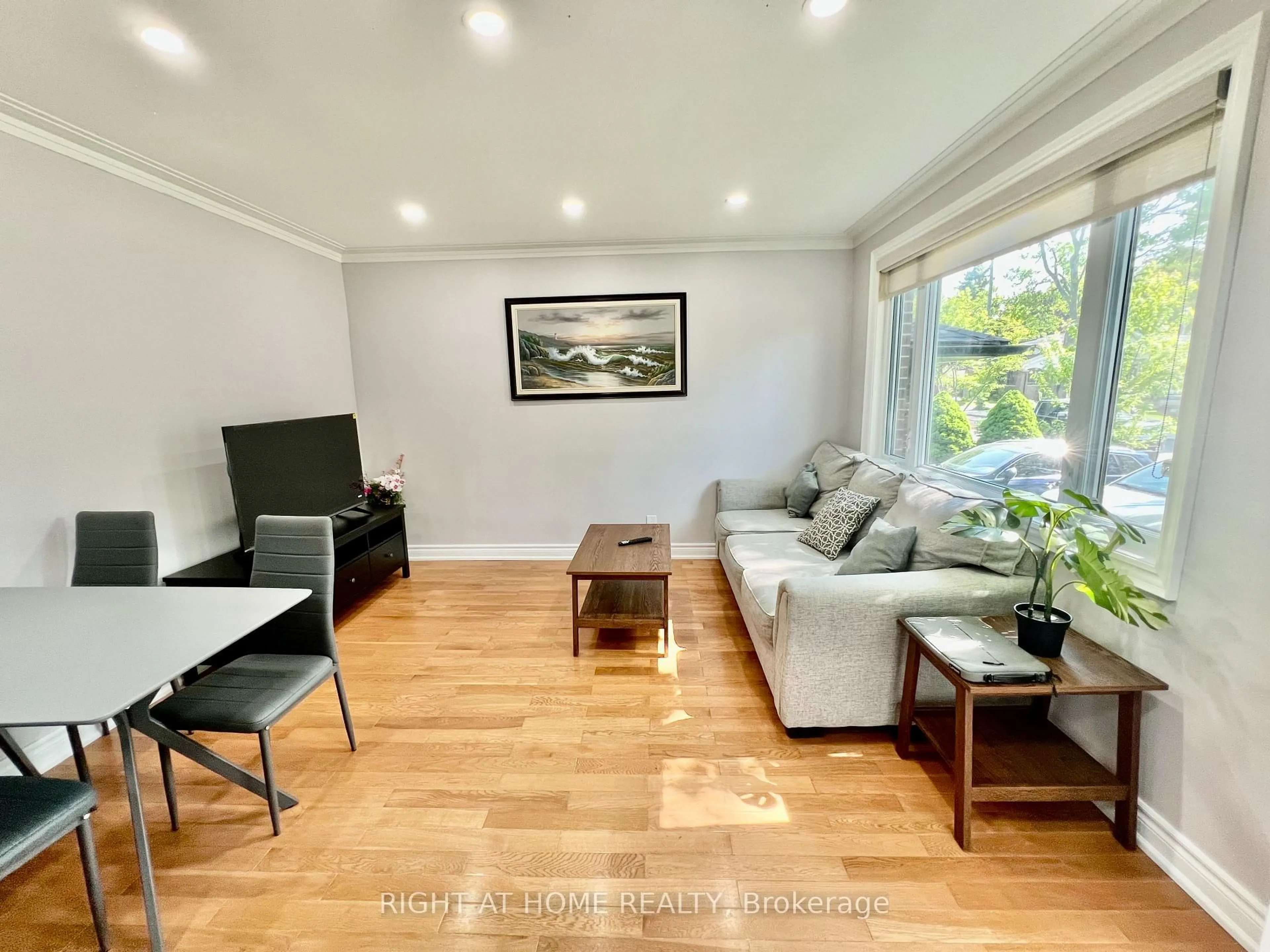 Living room with furniture, wood/laminate floor for 133 Brooklawn Ave, Toronto Ontario M1M 2P8