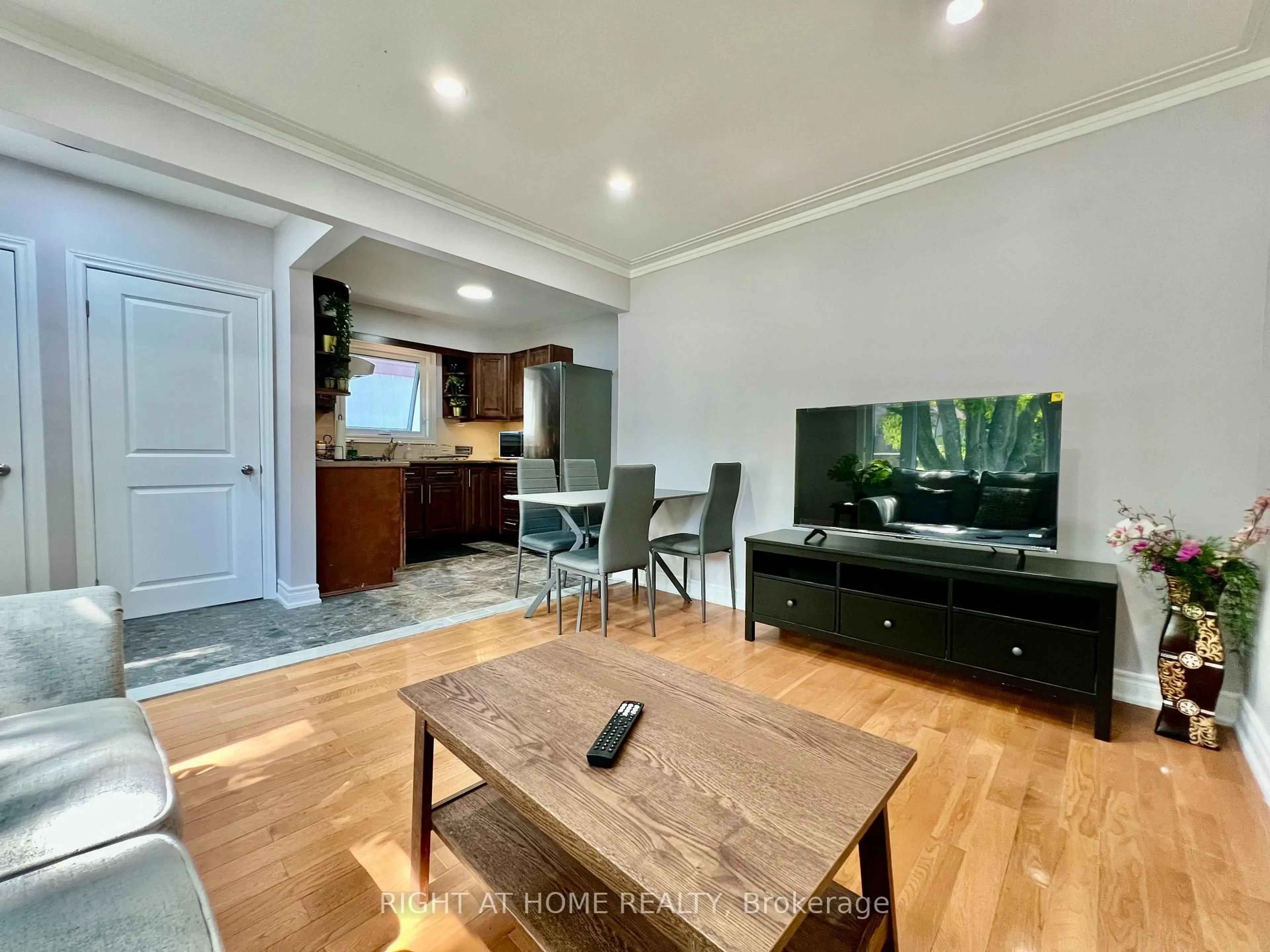 Living room with furniture, wood/laminate floor for 133 Brooklawn Ave, Toronto Ontario M1M 2P8