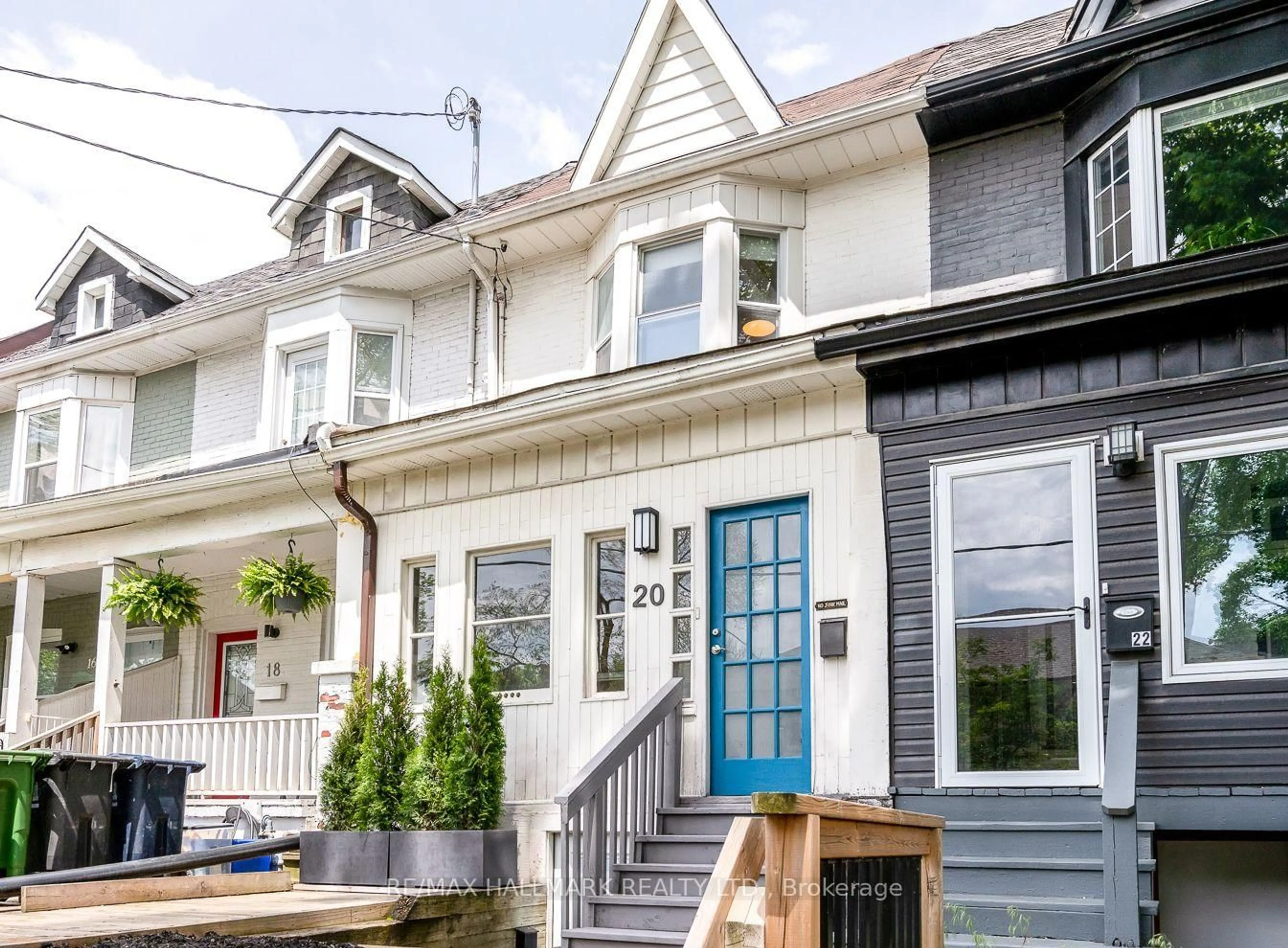 Home with vinyl exterior material, street for 20 Walpole Ave, Toronto Ontario M4L 2H9