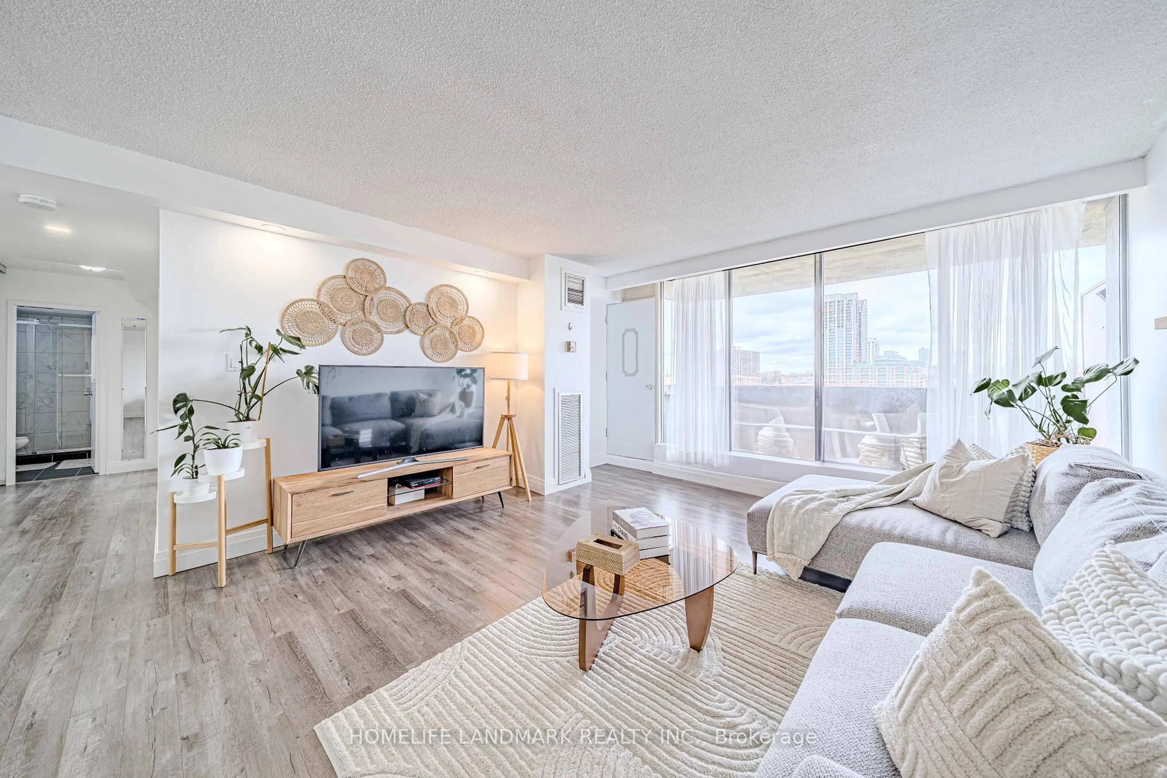 Living room with furniture, unknown for 40 Bay Mills Blvd #902, Toronto Ontario M1T 3P5