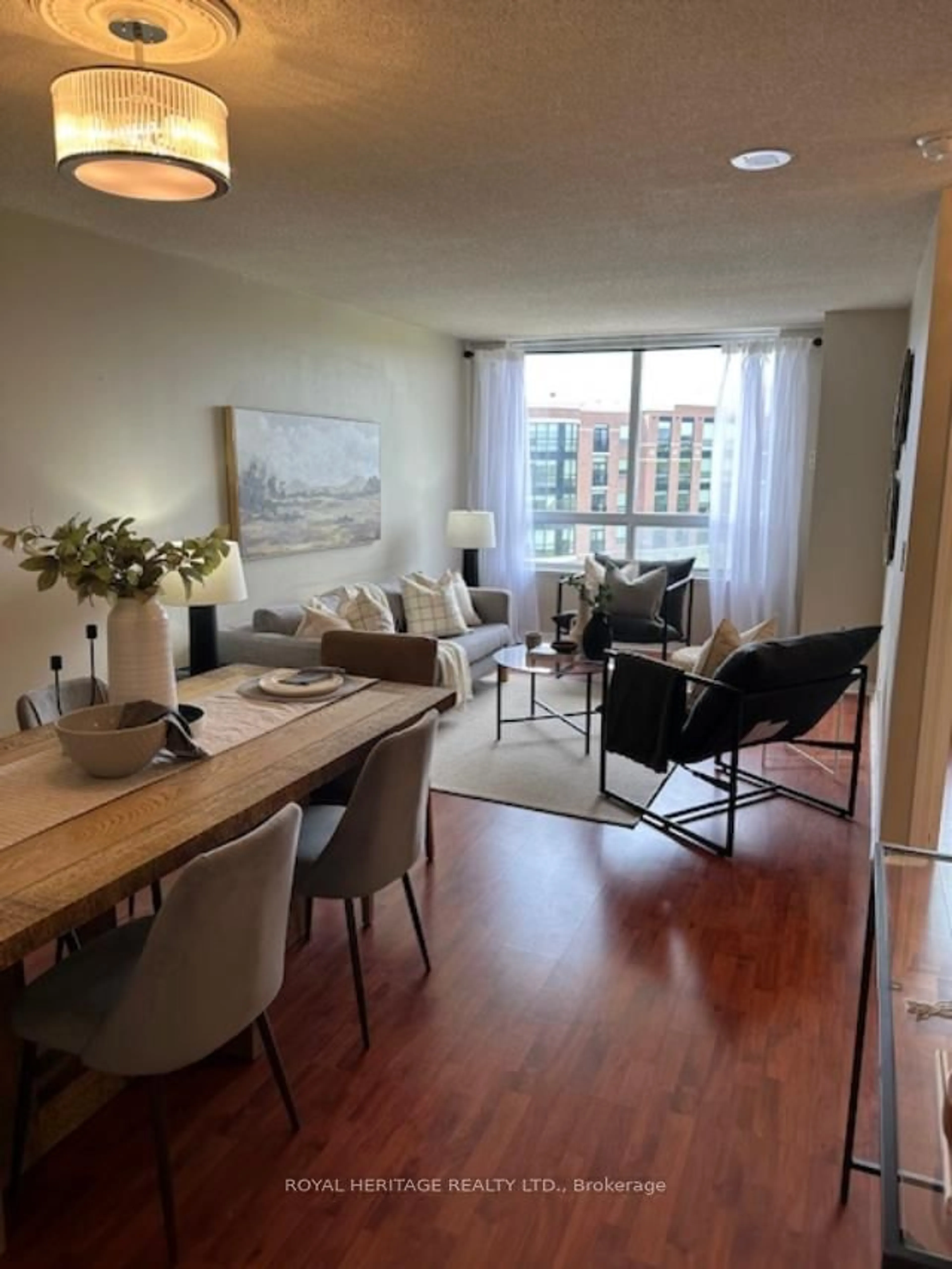 Living room with furniture, wood/laminate floor for 1000 The Esplanade N N/A #603, Pickering Ontario L1V 6V3
