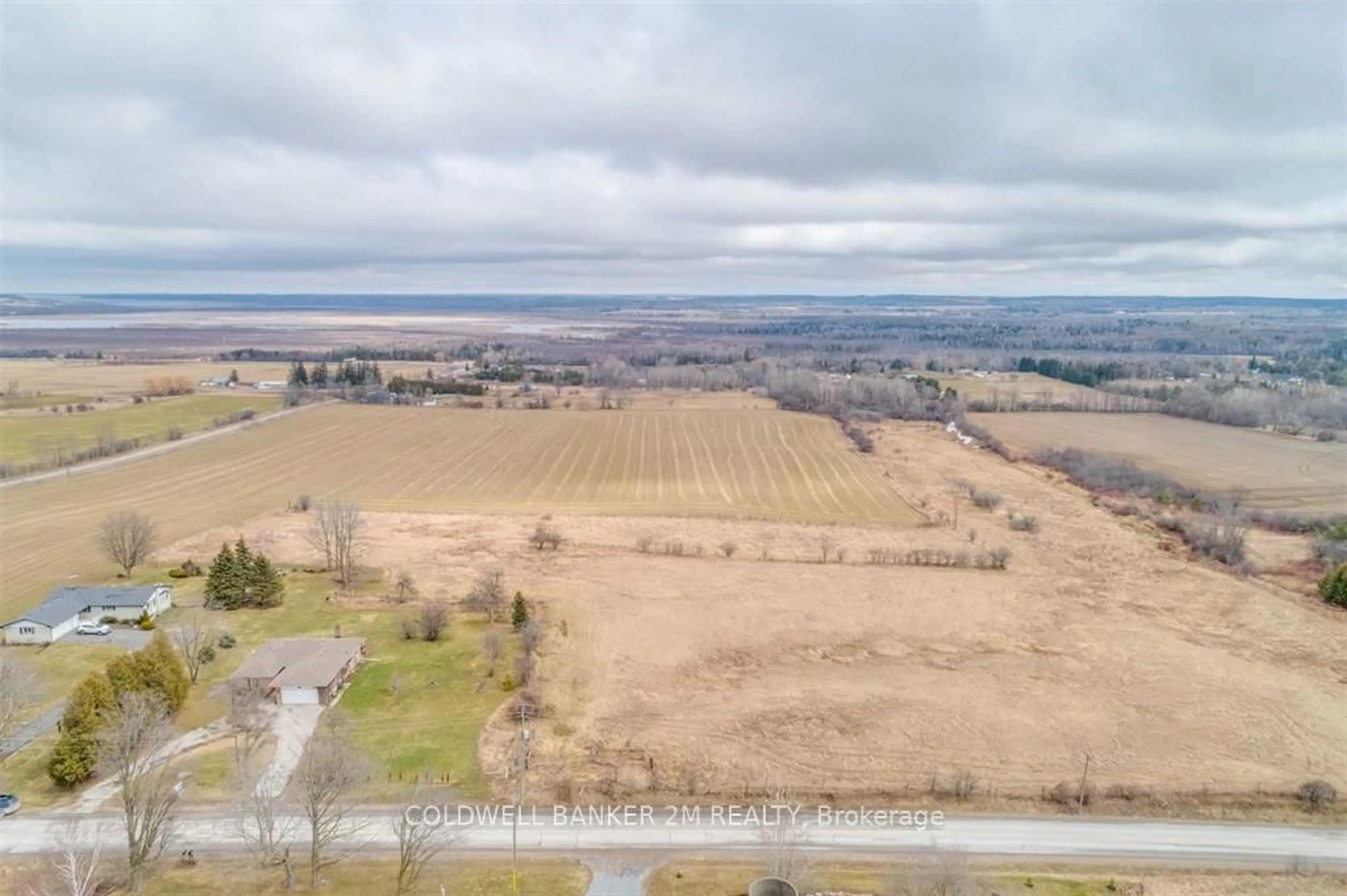 A pic from outside/outdoor area/front of a property/back of a property/a pic from drone, water/lake/river/ocean view for 12855 Old Simcoe Rd, Scugog Ontario L9L 1B3