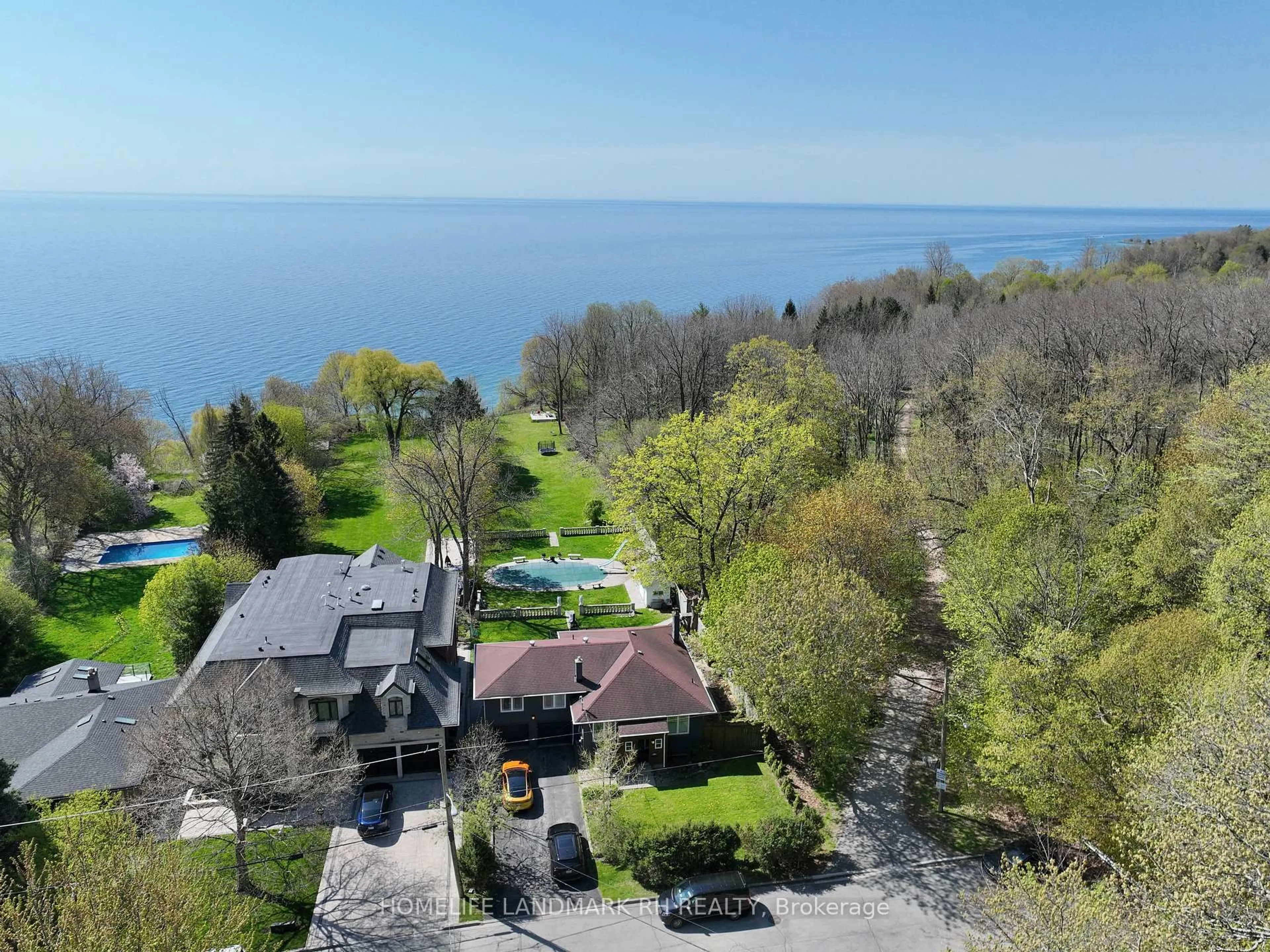 A pic from outside/outdoor area/front of a property/back of a property/a pic from drone, water/lake/river/ocean view for 61 Sylvan Ave, Toronto Ontario M1M 1J9