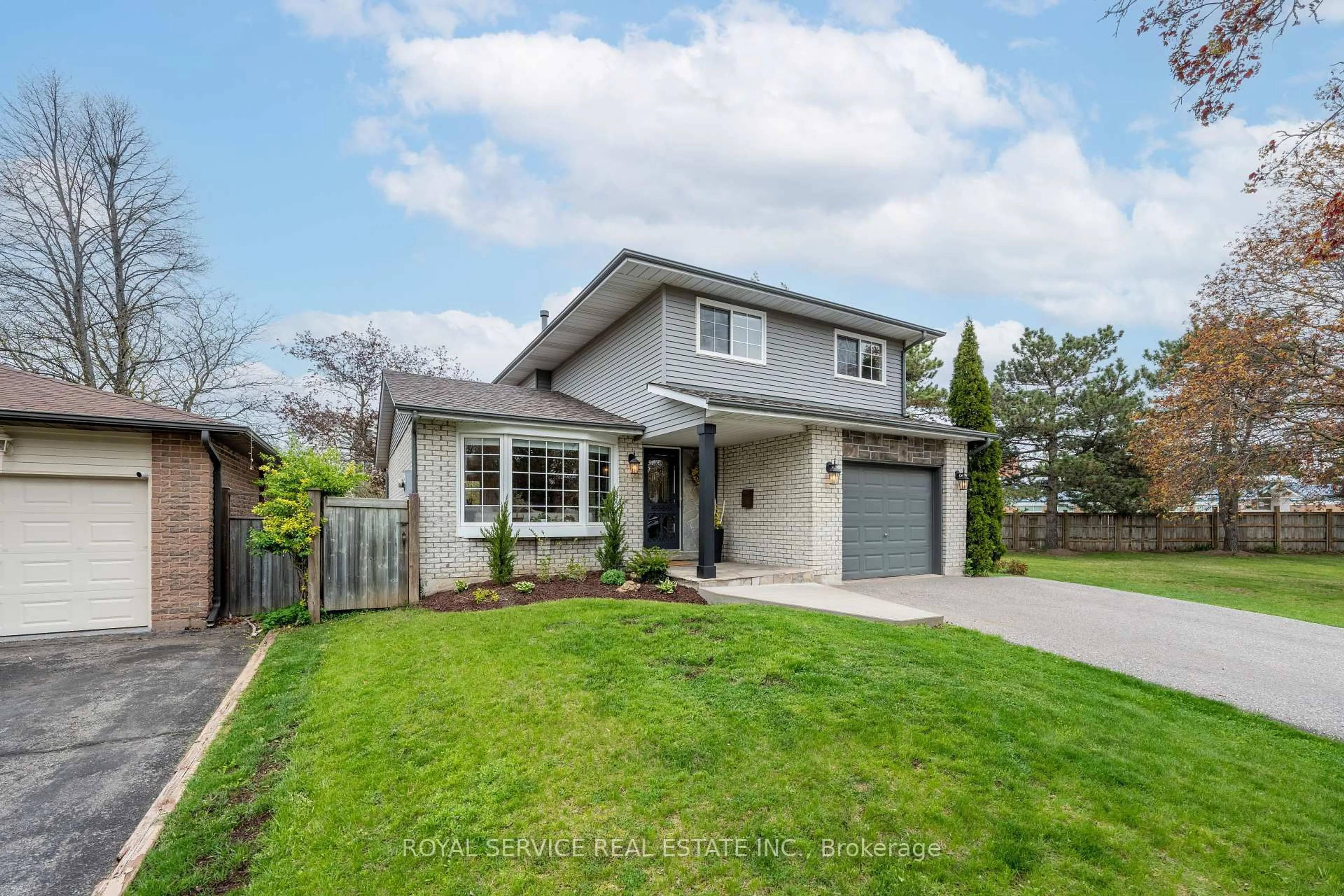 Home with brick exterior material, street for 1174 Trillium Crt, Oshawa Ontario L1G 7M2