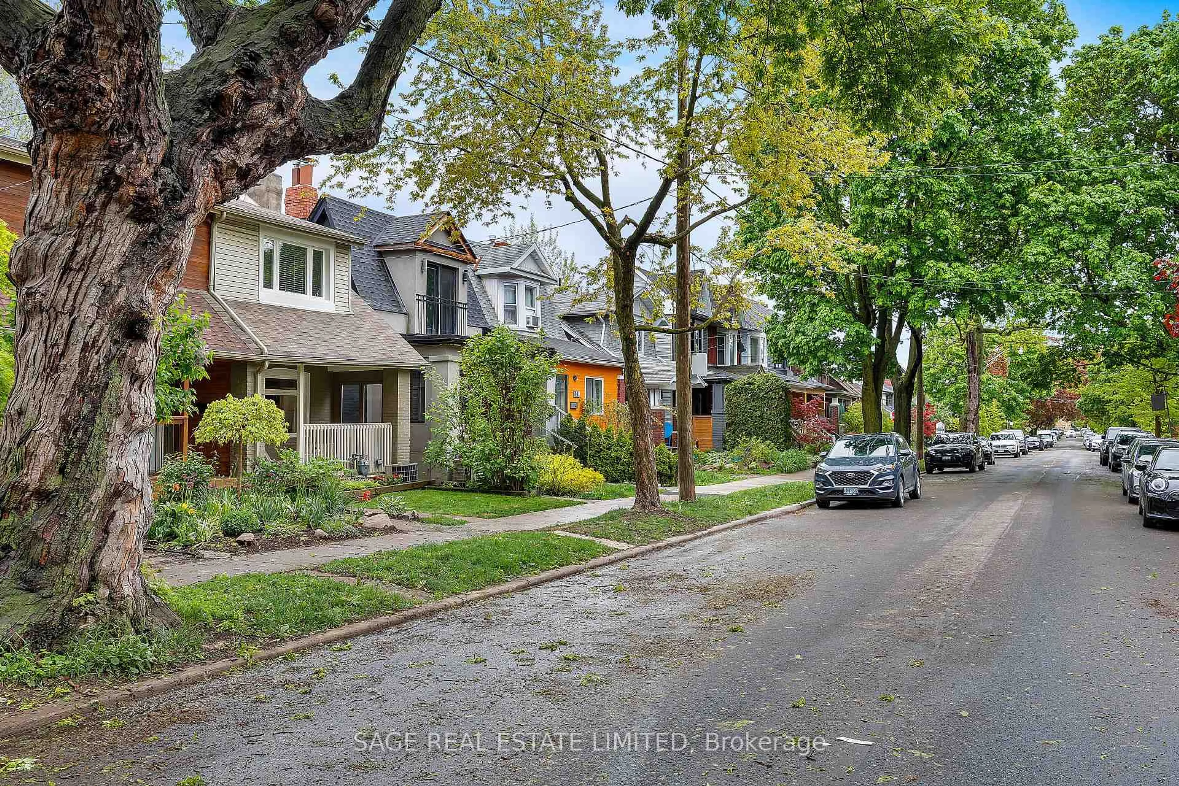 Home with brick exterior material, street for 113 Alton Ave, Toronto Ontario M4L 2M3