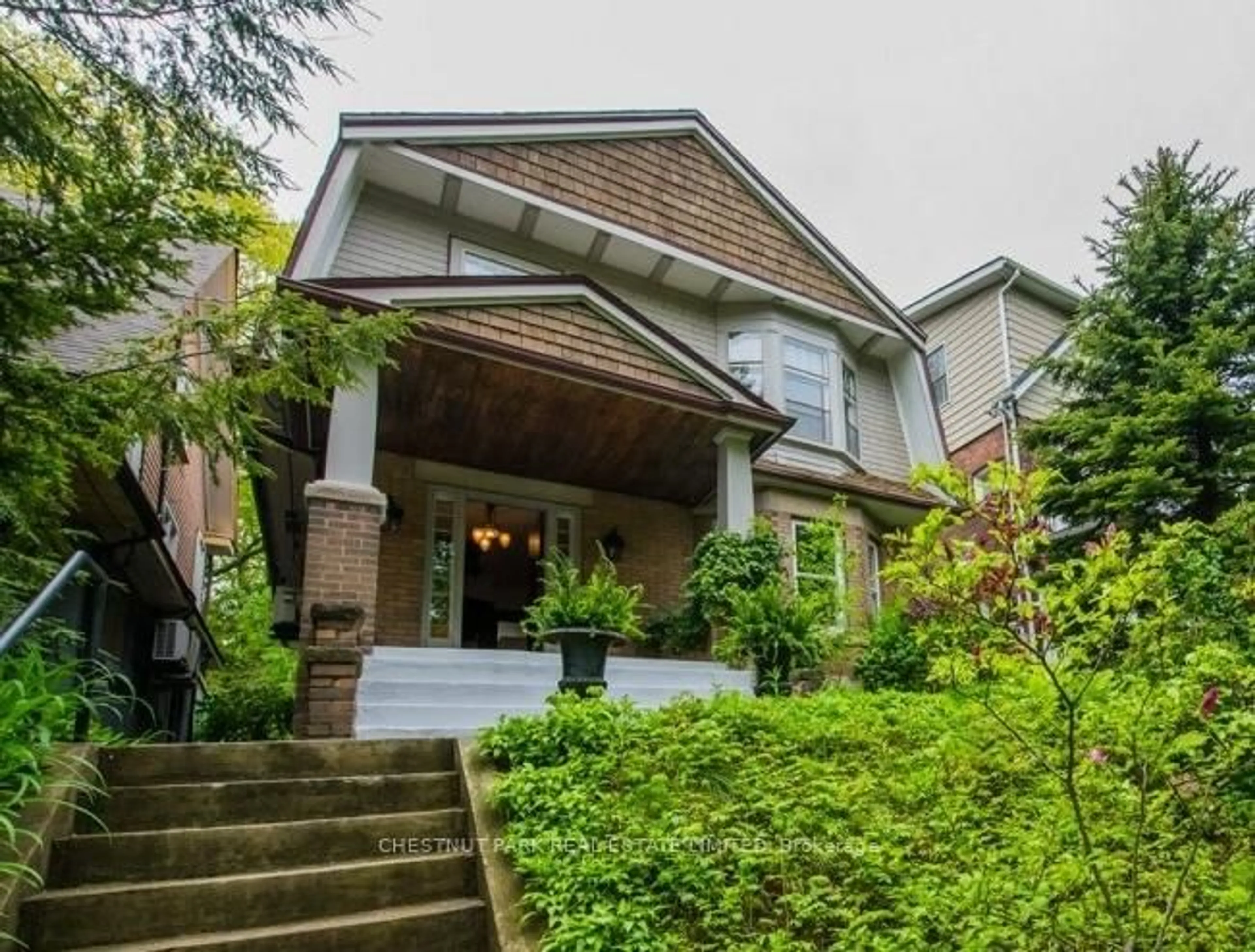 Home with brick exterior material, street for 100 Neville Park Blvd, Toronto Ontario M4E 3P8