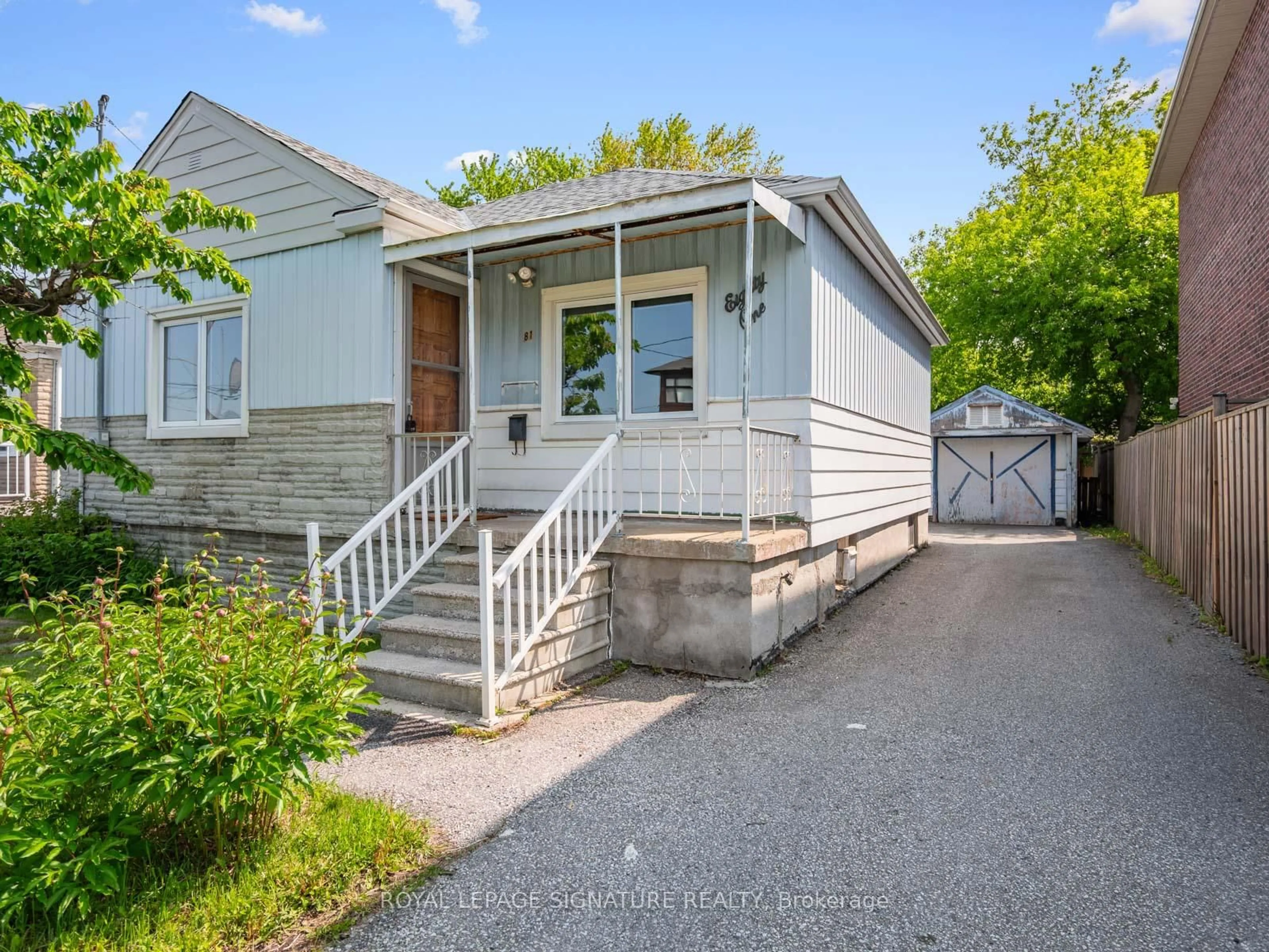 Home with vinyl exterior material, street for 81 Laurel Ave, Toronto Ontario M1K 3J7