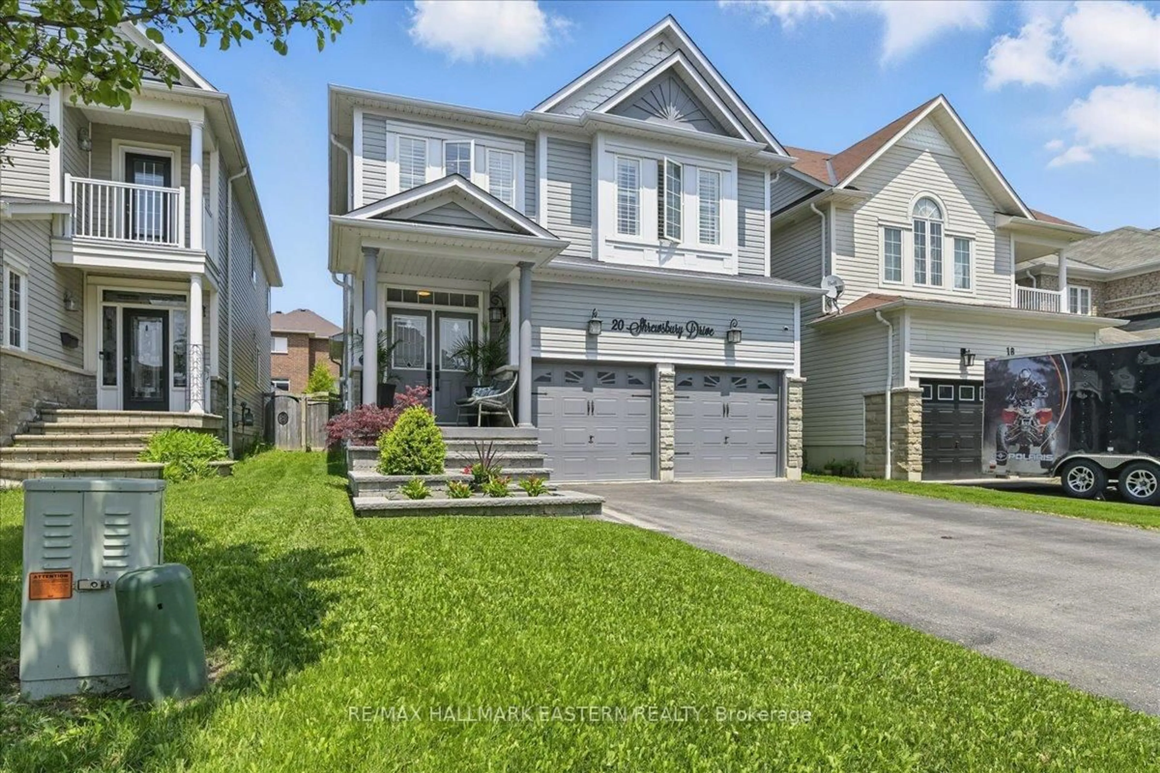 Home with vinyl exterior material, street for 20 Shrewsbury Dr, Whitby Ontario L1M 0C7