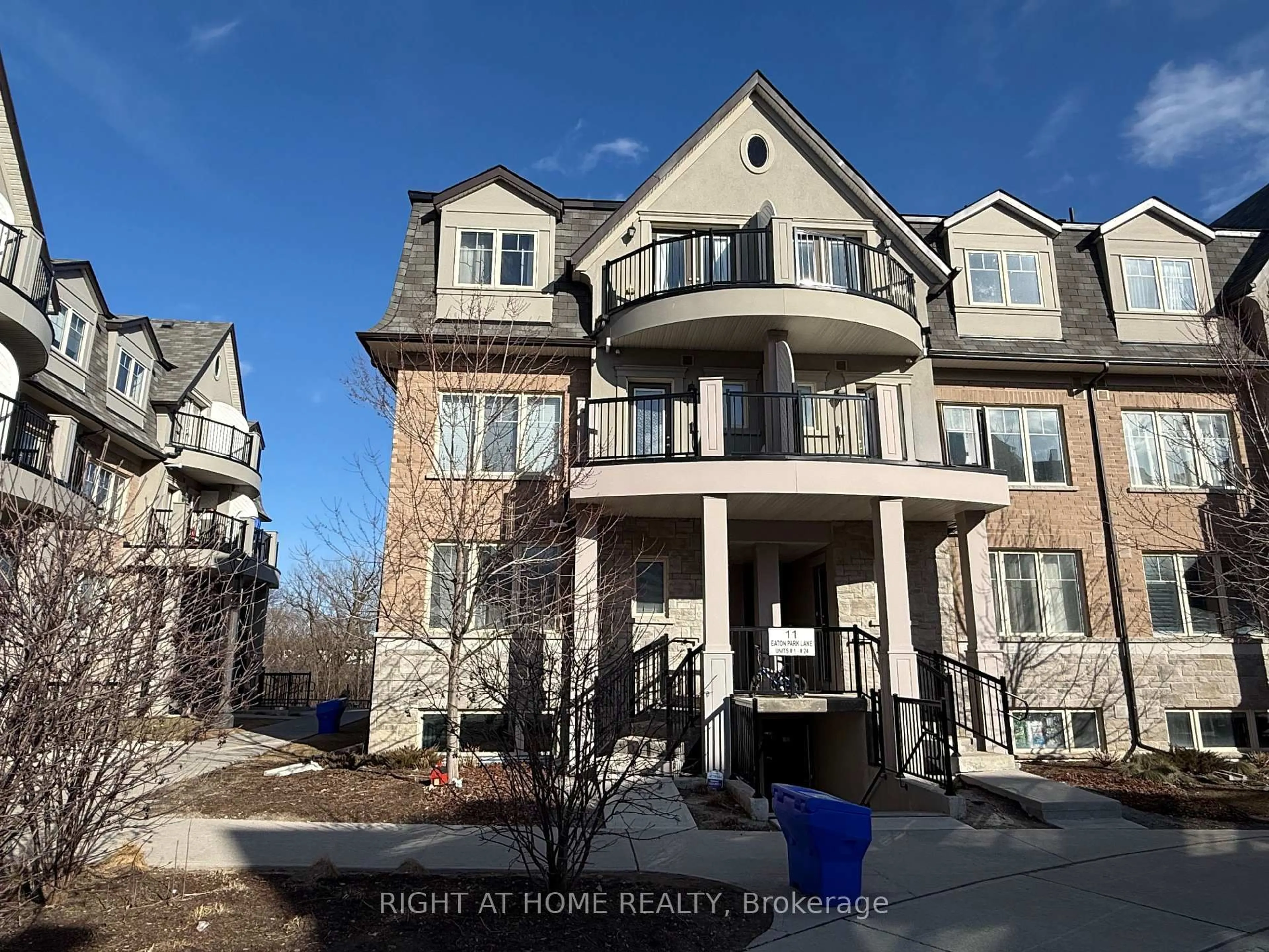 A pic from outside/outdoor area/front of a property/back of a property/a pic from drone, unknown for 11 Eaton Park Lane #3, Toronto Ontario M1W 0A5