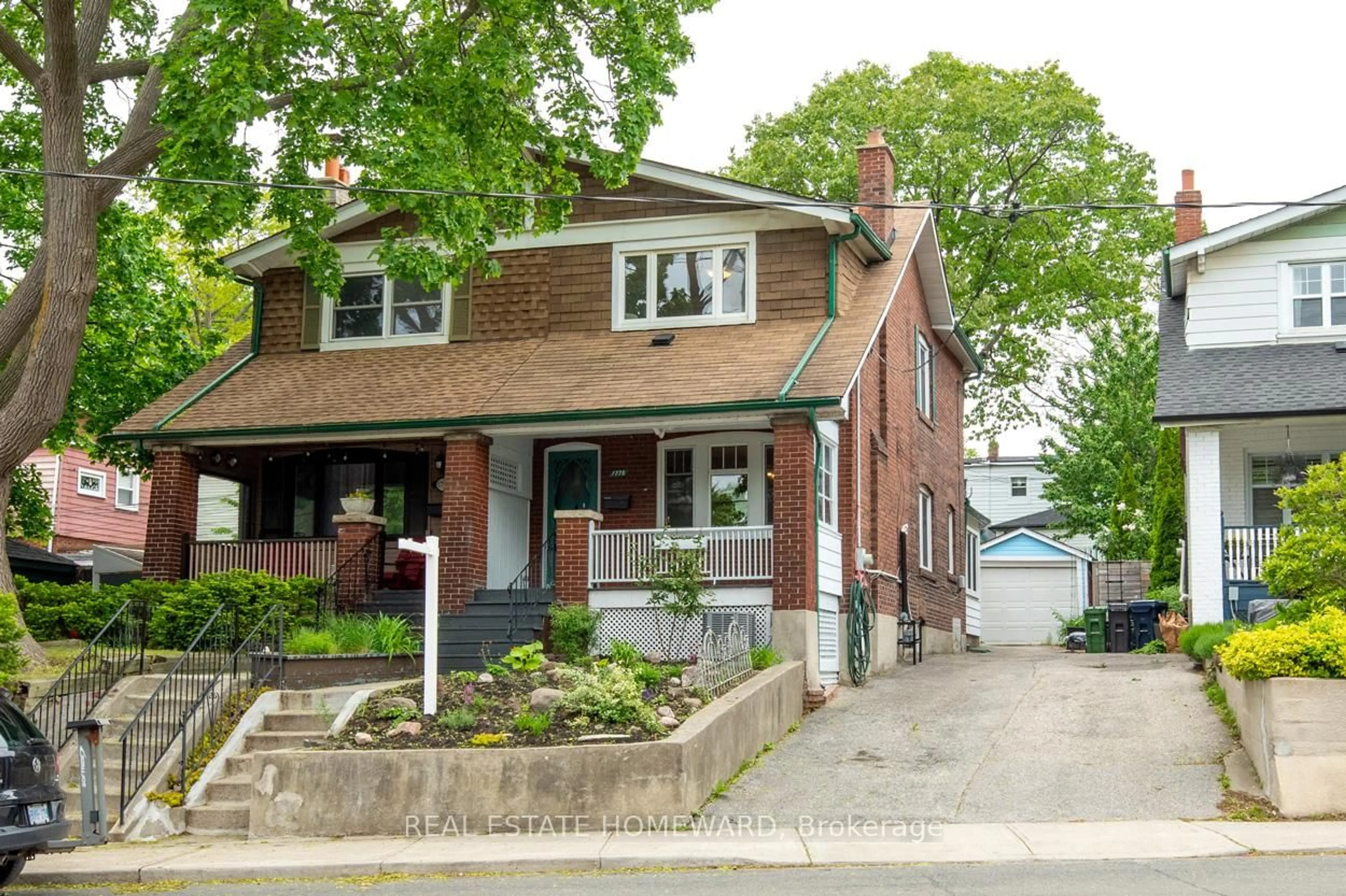 Home with brick exterior material, street for 1778 Gerrard St, Toronto Ontario M4L 2B4