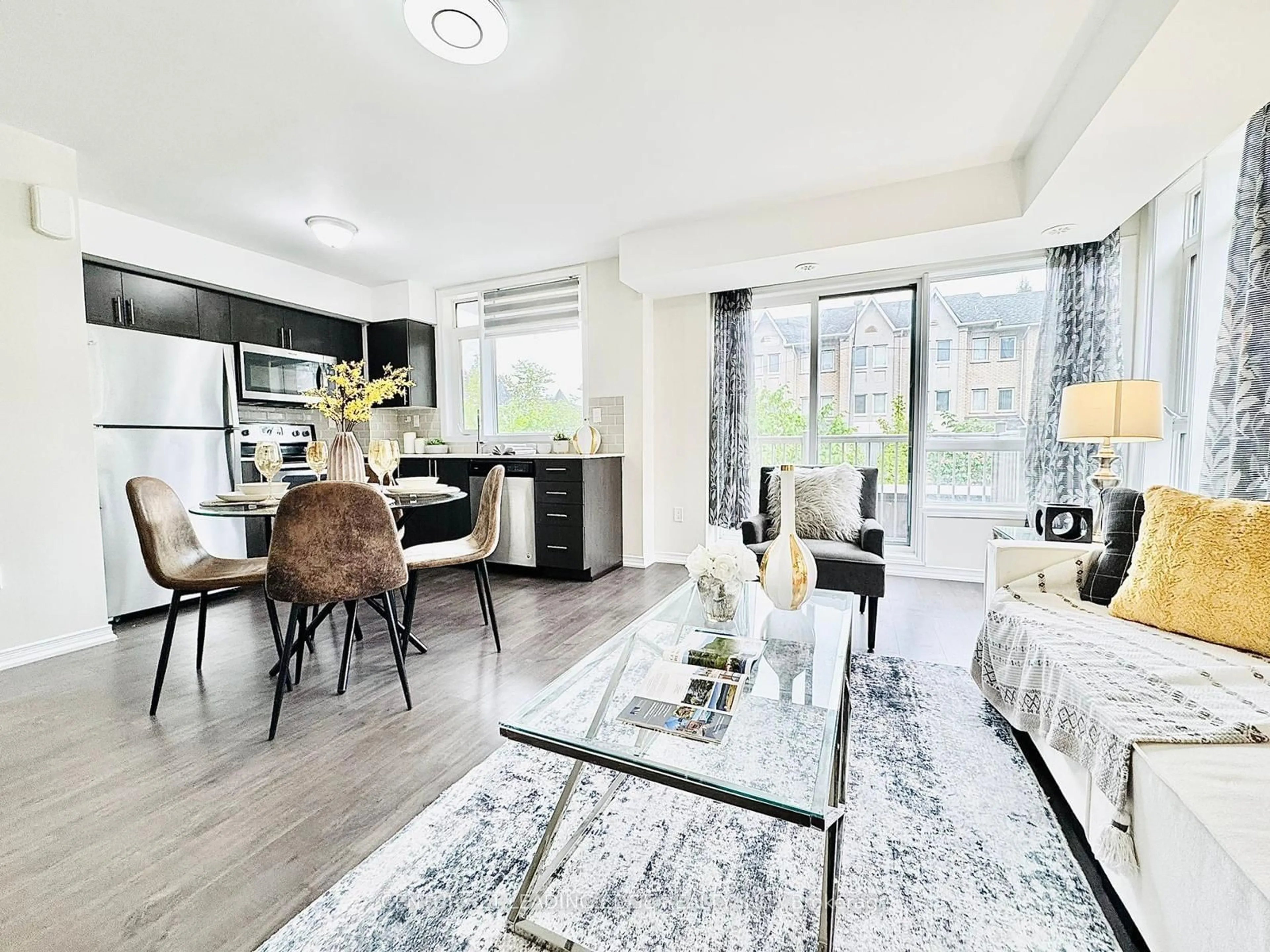 Living room with furniture, unknown for 80 Orchid Place Dr #303, Toronto Ontario M1B 0C4