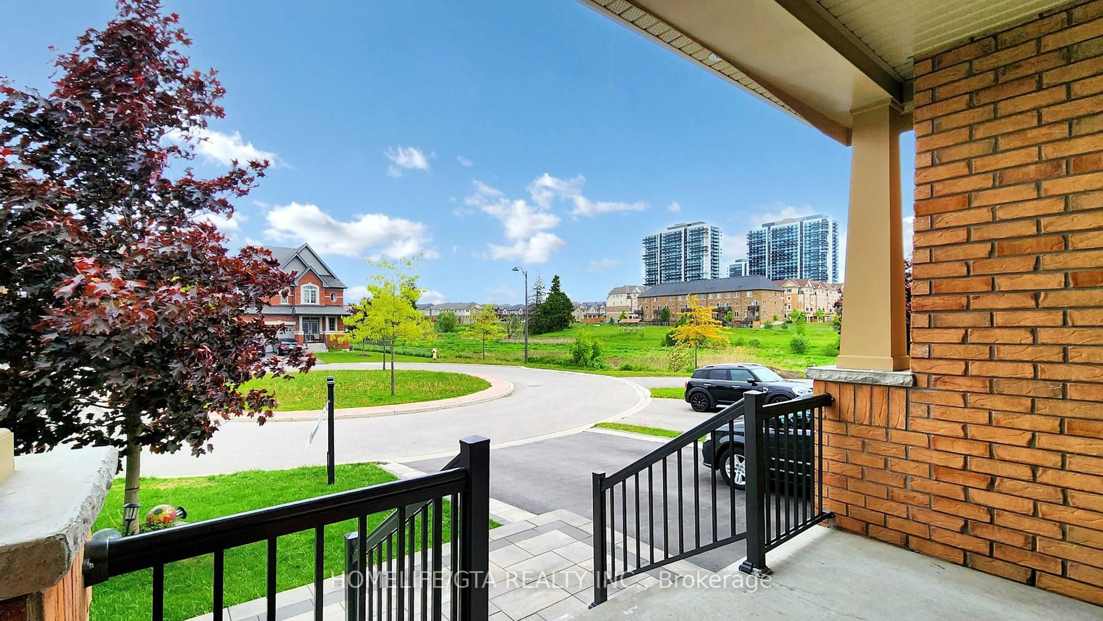 Patio, city buildings view from balcony for 145 Hyperion Crt, Oshawa Ontario L1L 0K1