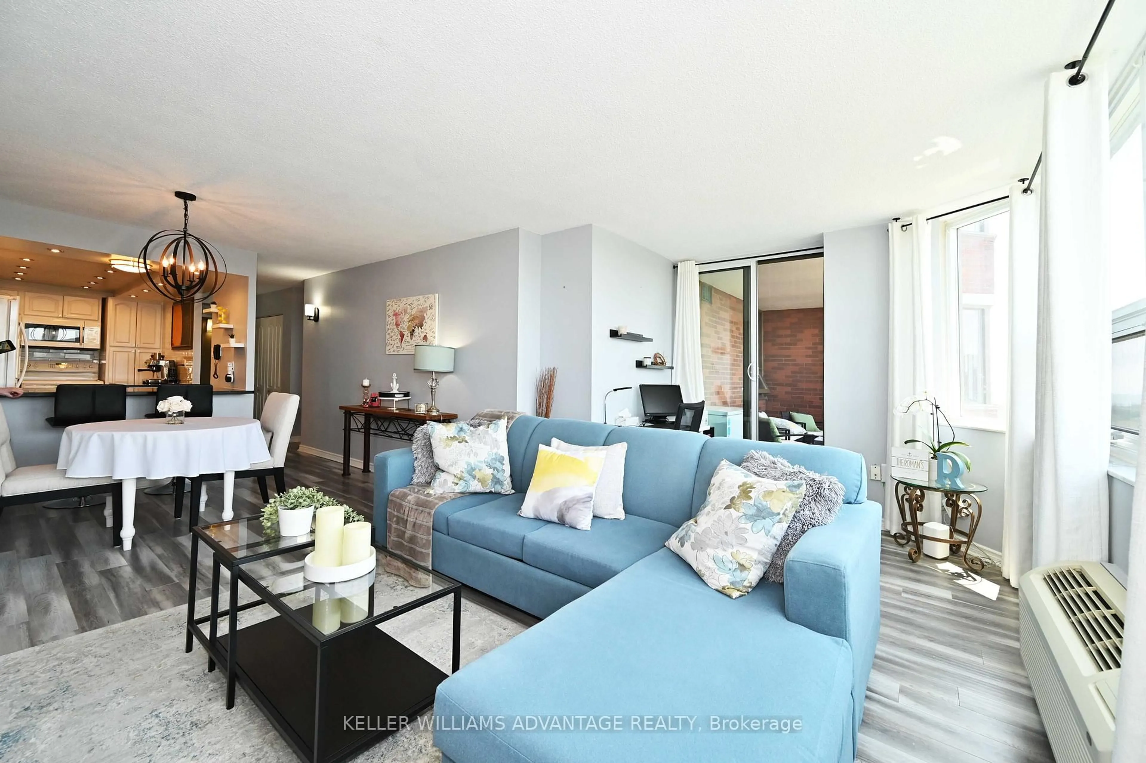 Living room with furniture, unknown for 121 Ling Rd #1804, Toronto Ontario M1E 4Y2