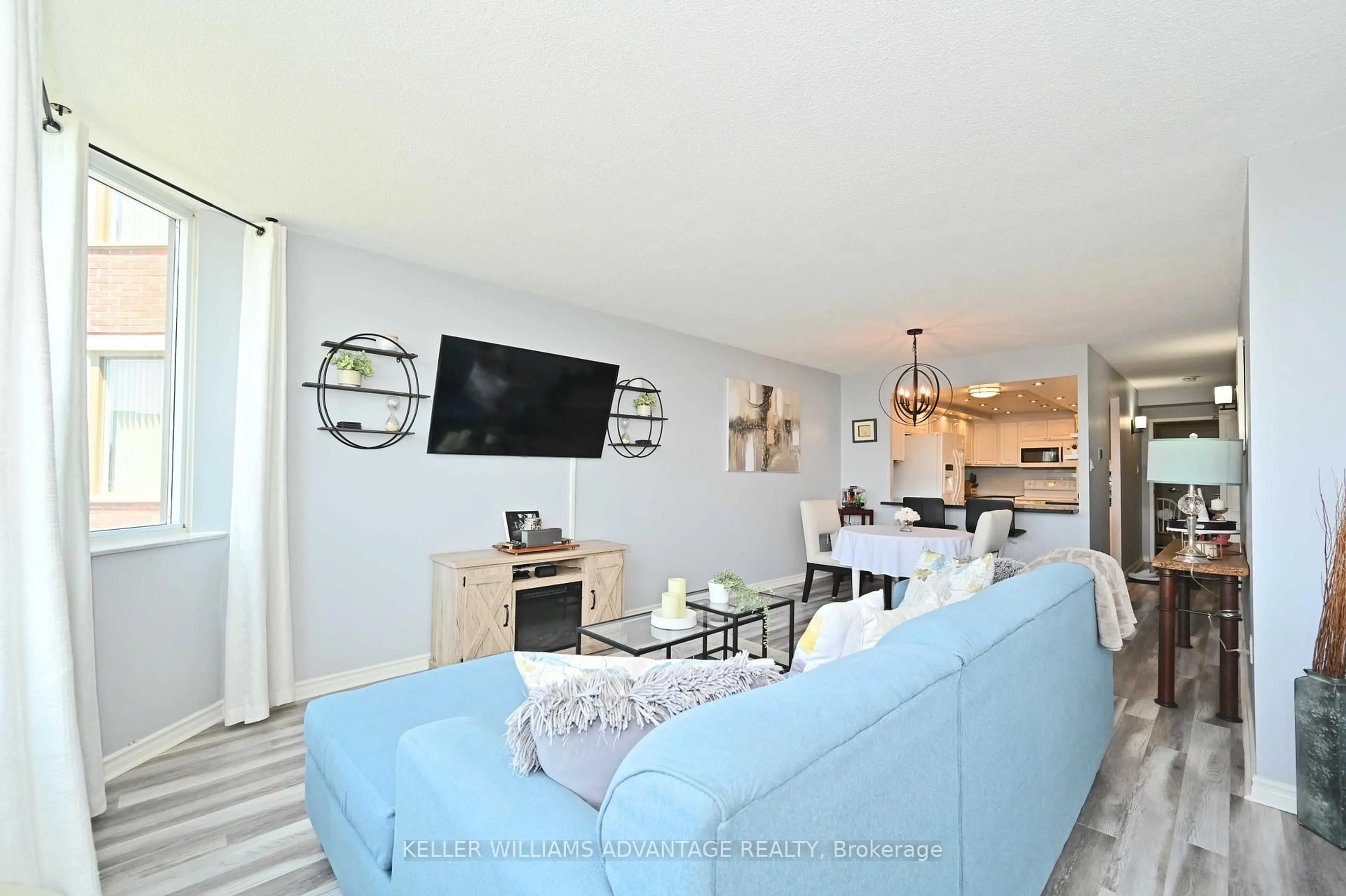 Living room with furniture, unknown for 121 Ling Rd #1804, Toronto Ontario M1E 4Y2