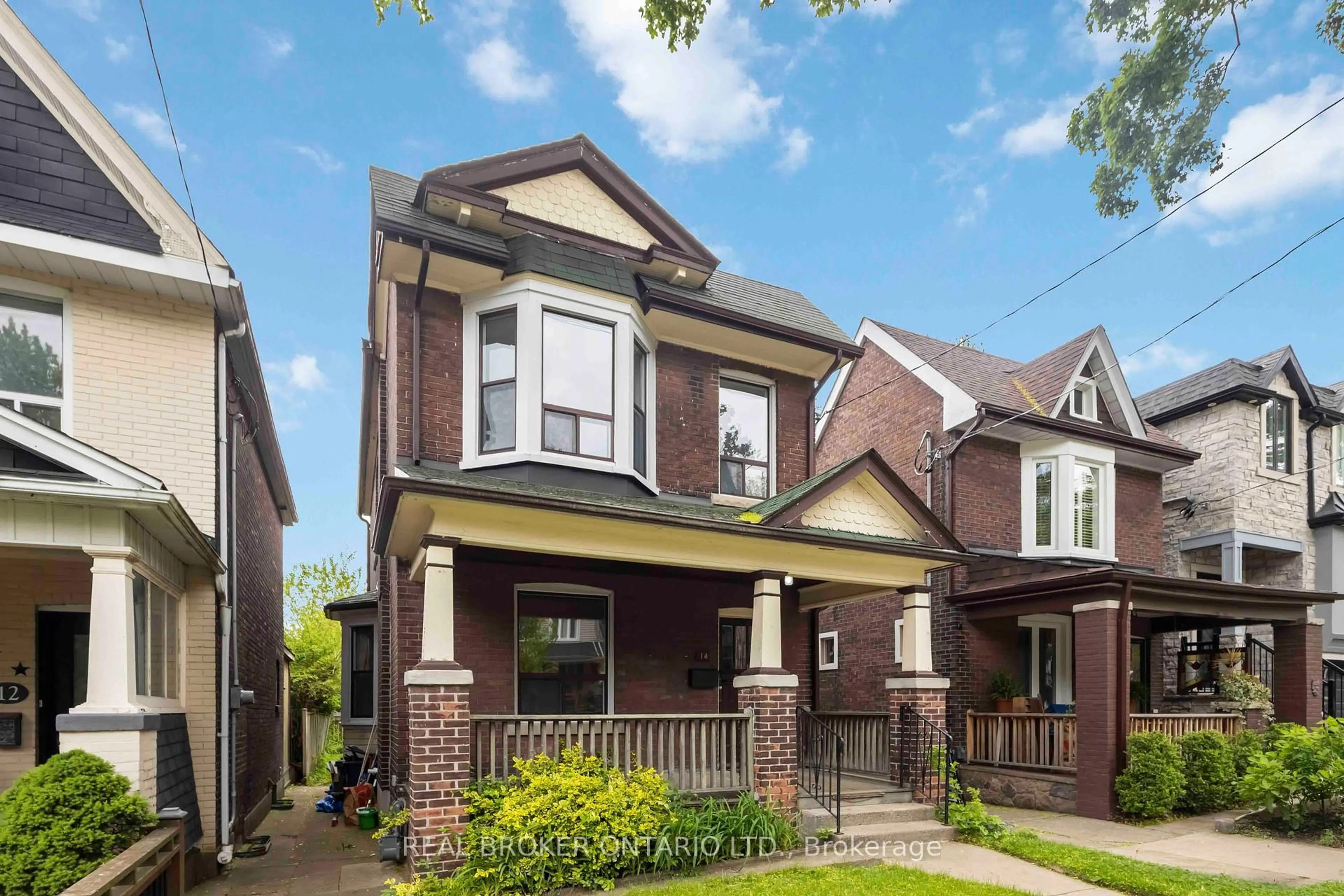 Home with brick exterior material, street for 14 Devon Rd, Toronto Ontario M4E 2J8