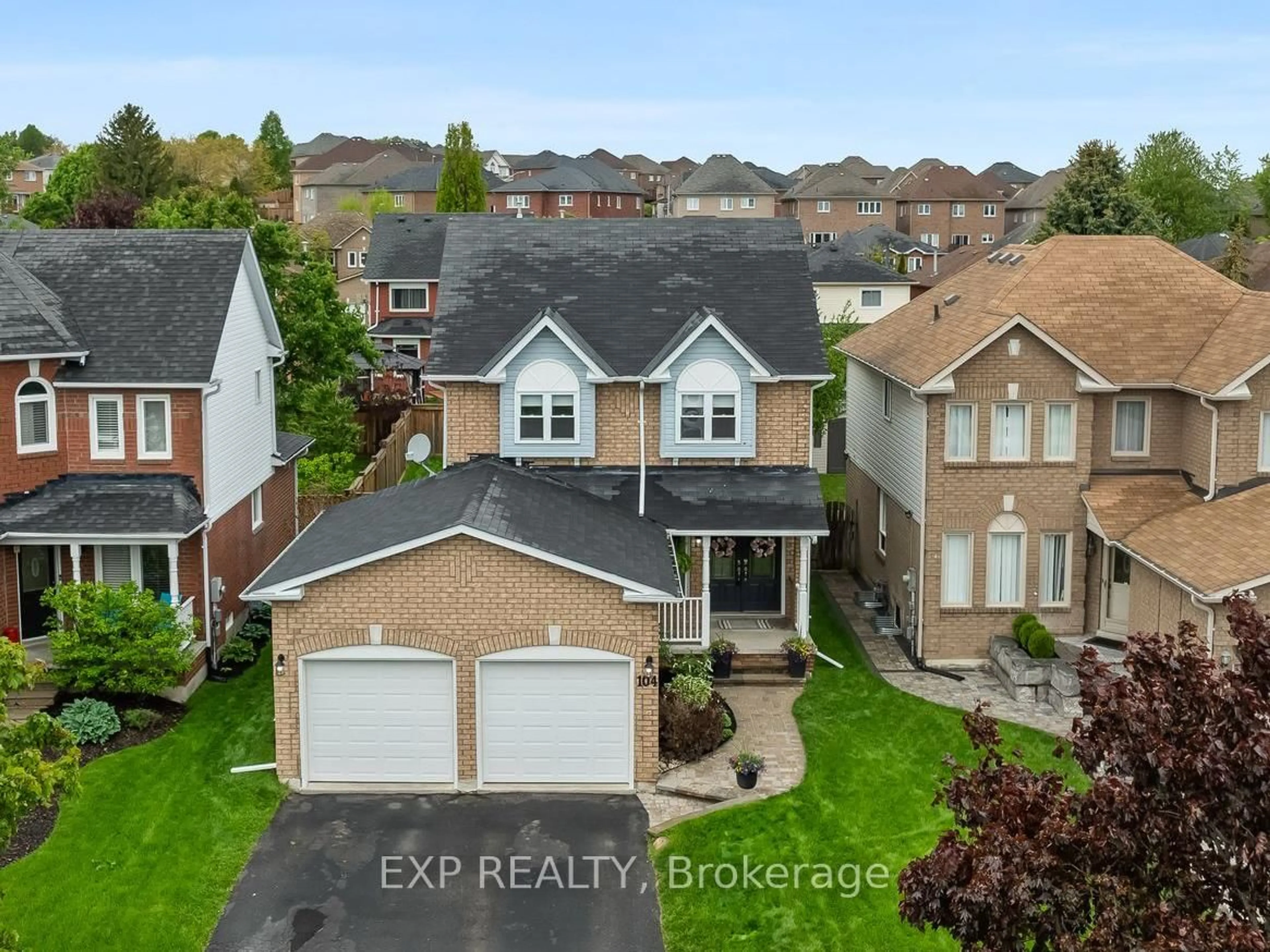 A pic from outside/outdoor area/front of a property/back of a property/a pic from drone, street for 104 Apple Blossom Blvd, Clarington Ontario L1C 4T7
