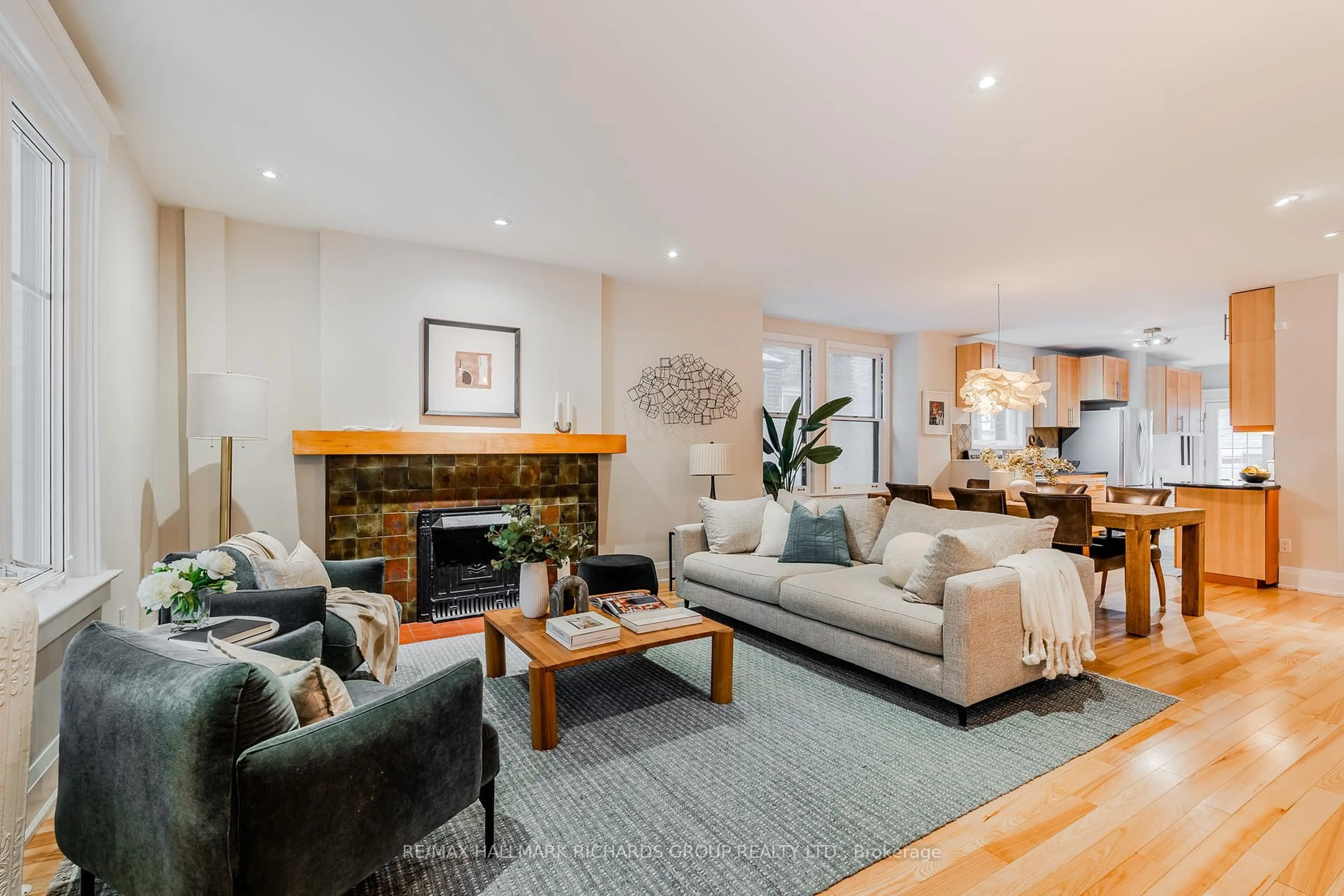 Living room with furniture, wood/laminate floor for 78 Wheeler Ave, Toronto Ontario M4L 3V2