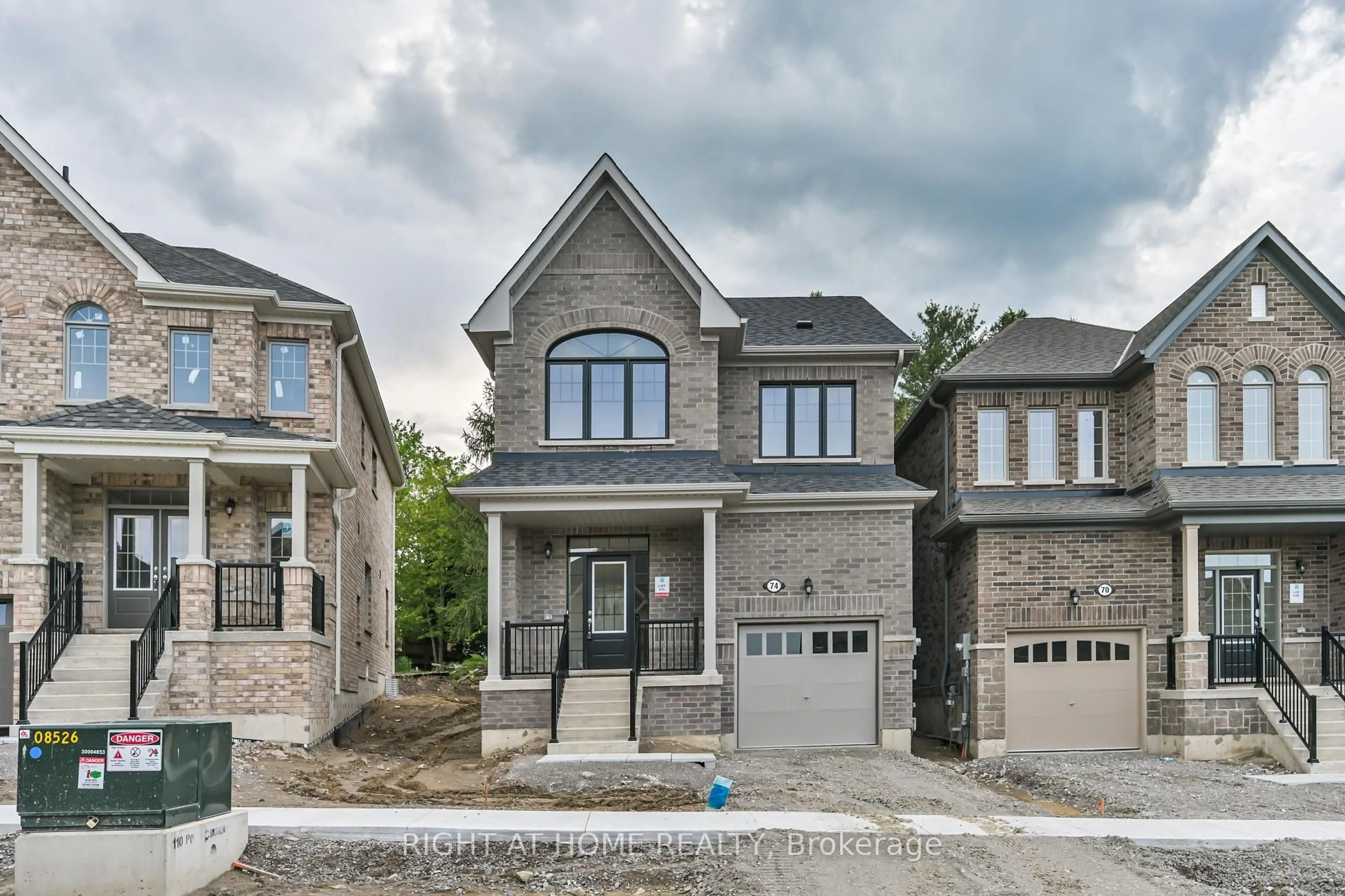 Home with brick exterior material, street for 74 North Garden Blvd, Scugog Ontario L9L 2C7