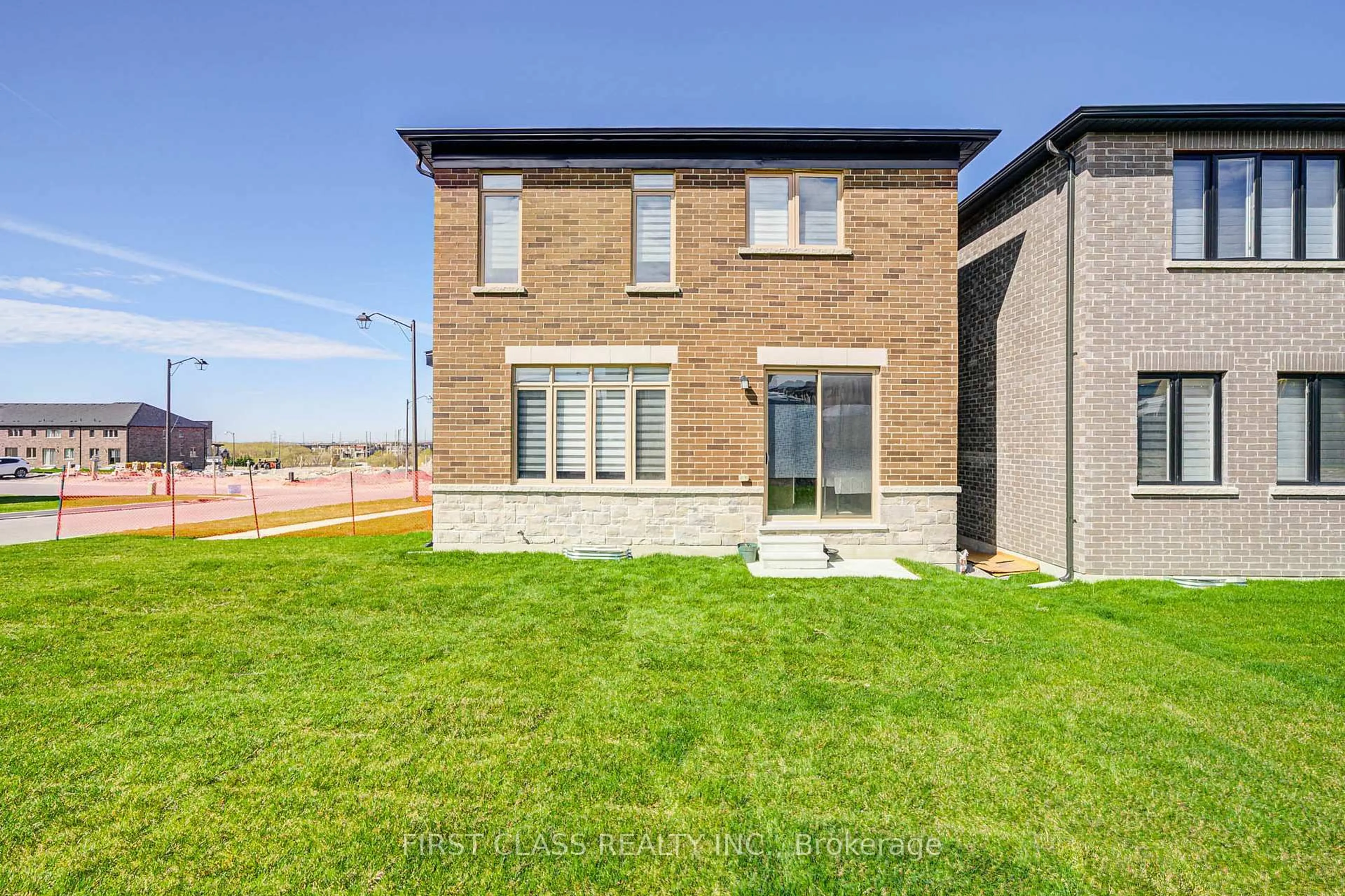 Home with brick exterior material, street for 2049 Chris Mason St, Oshawa Ontario L1H 7K5