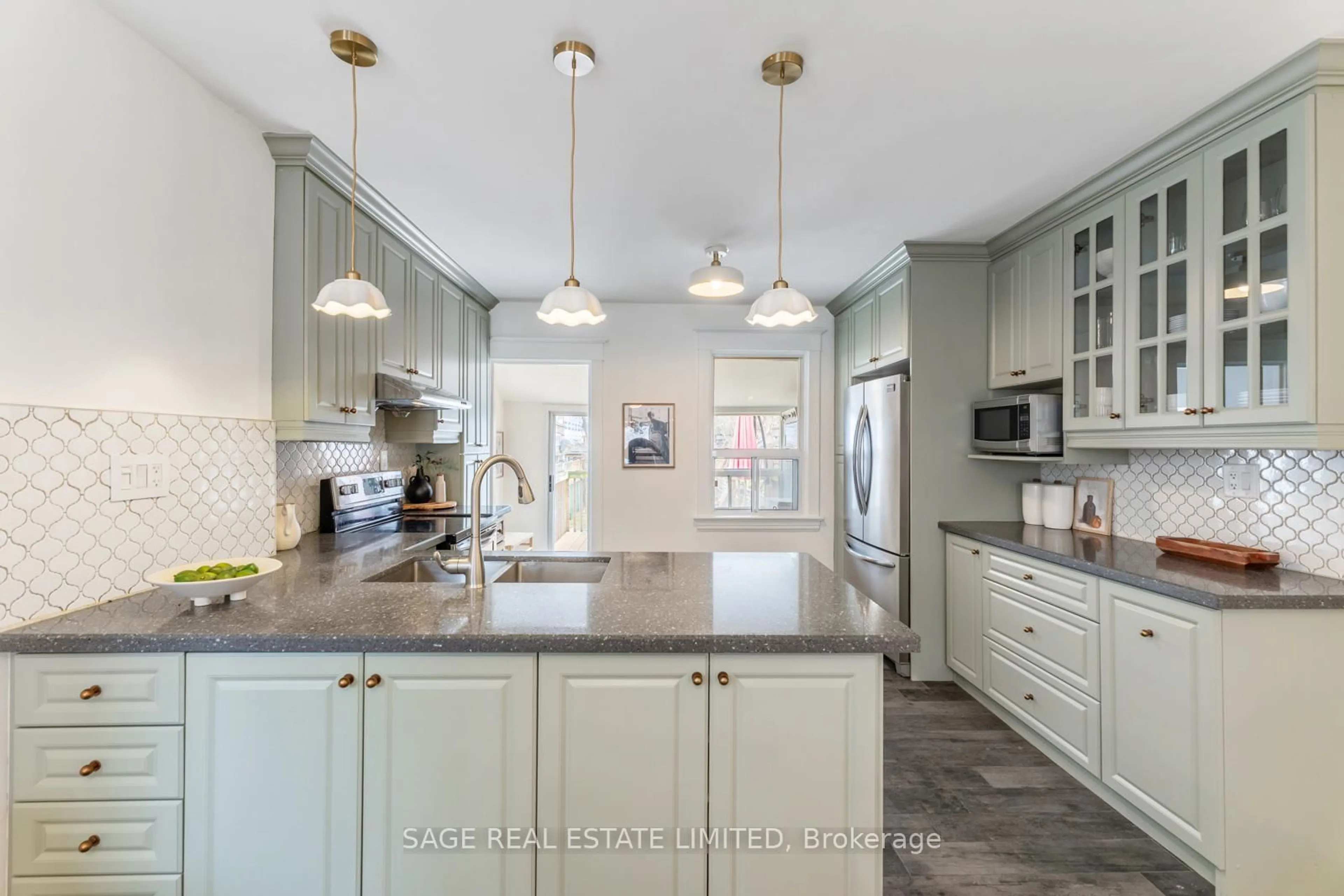 Open concept kitchen, ceramic/tile floor for 80 Rosevear Ave, Toronto Ontario M4C 1Z4