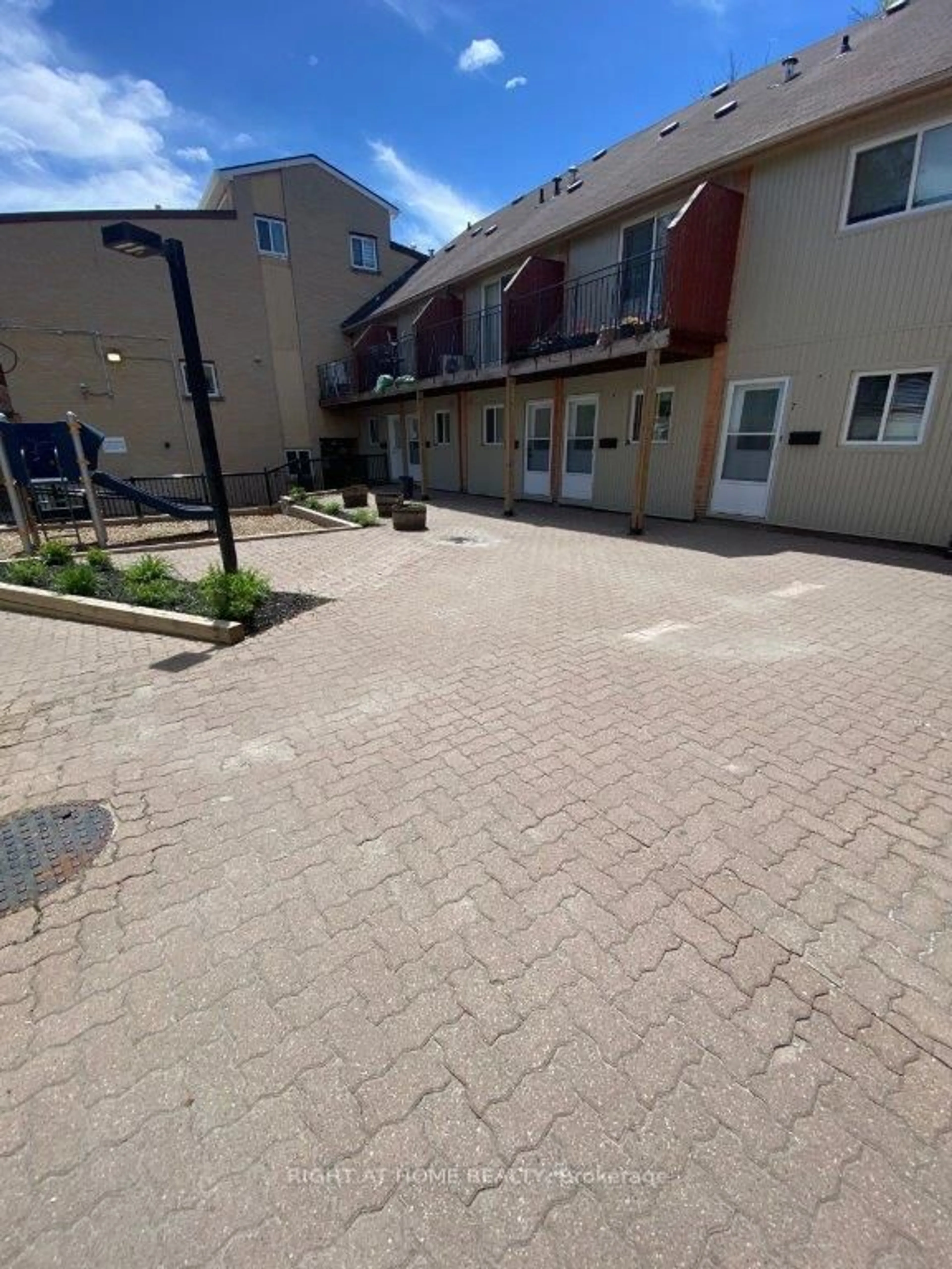 Patio, street for 1209 Queen St #5, Toronto Ontario M4M 3H4