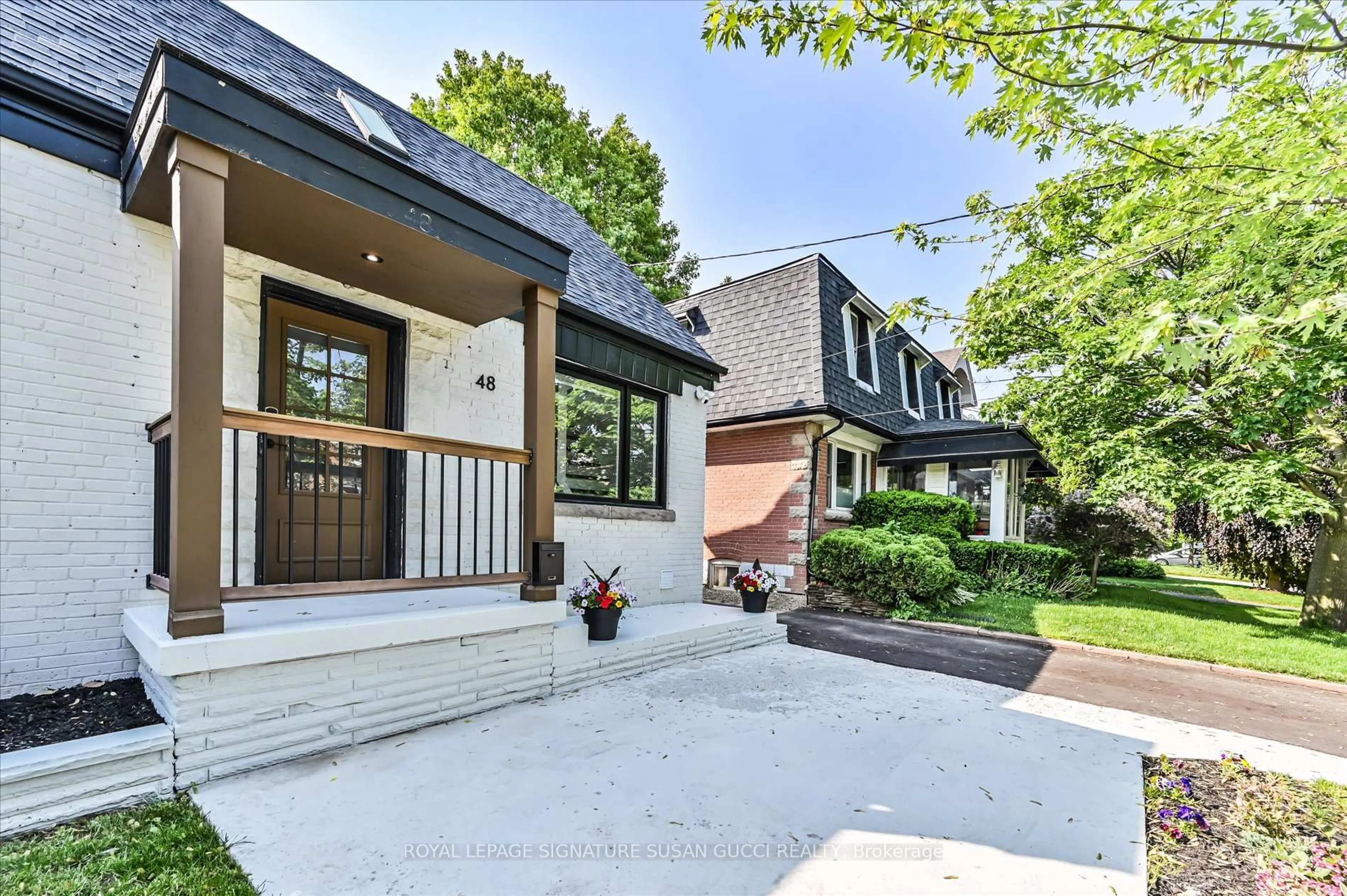 Home with brick exterior material, street for 48 Denvale Rd, Toronto Ontario M4B 3B7