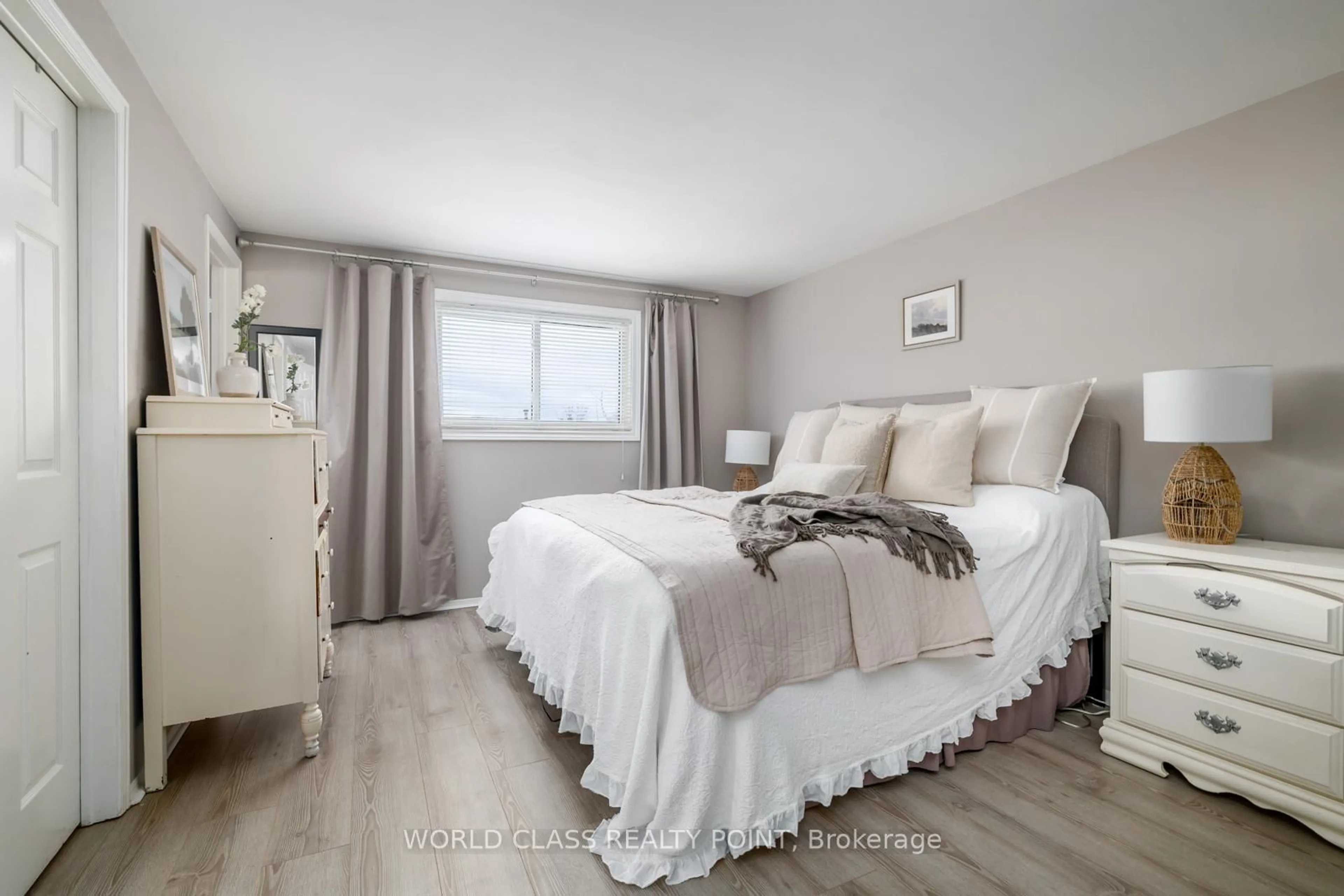Bedroom with bed, wood/laminate floor for 107 Foxhunt Tr, Clarington Ontario L1E 1E1