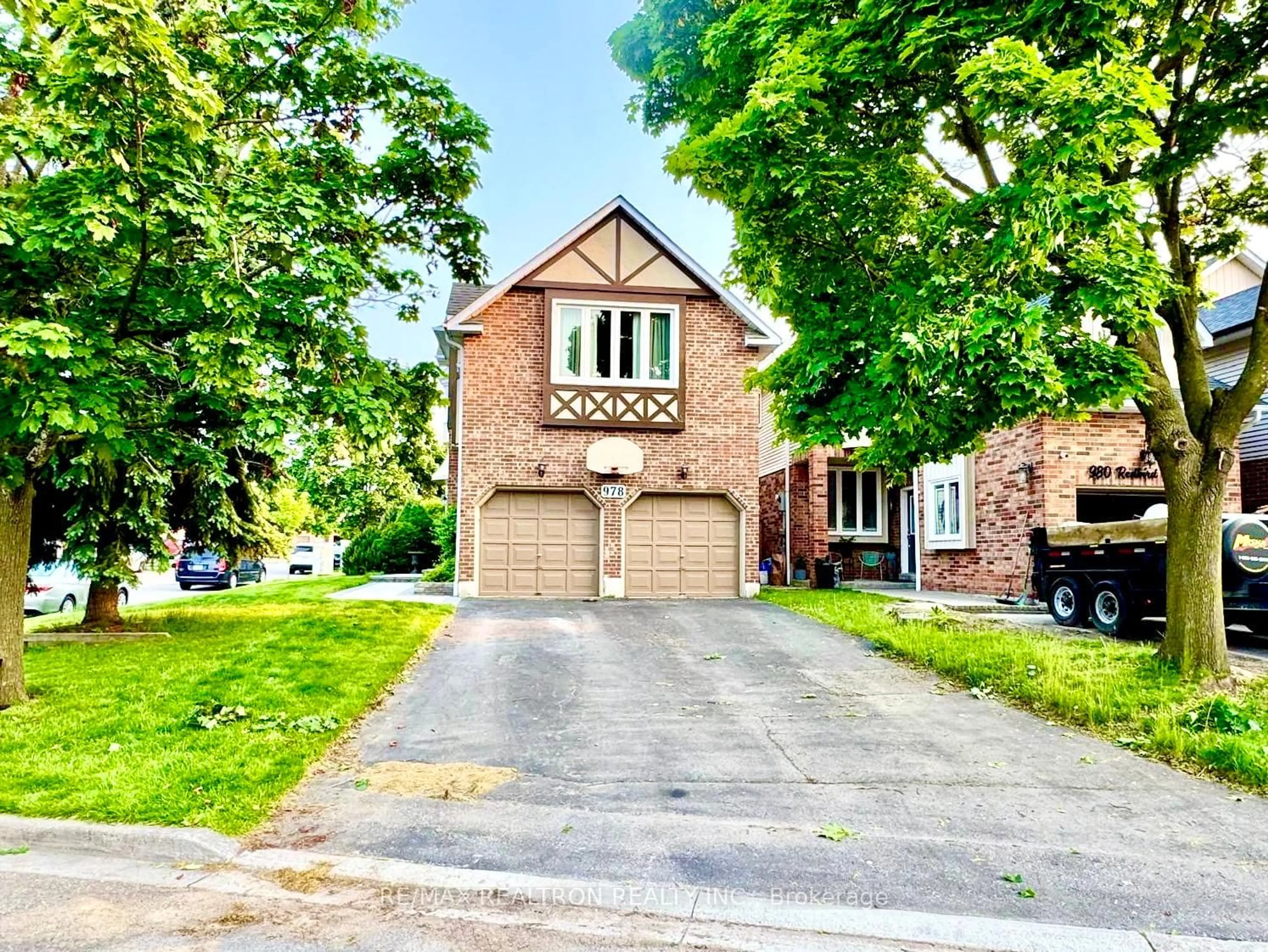 Home with brick exterior material, street for 978 Redbird Cres, Pickering Ontario L1V 5K7