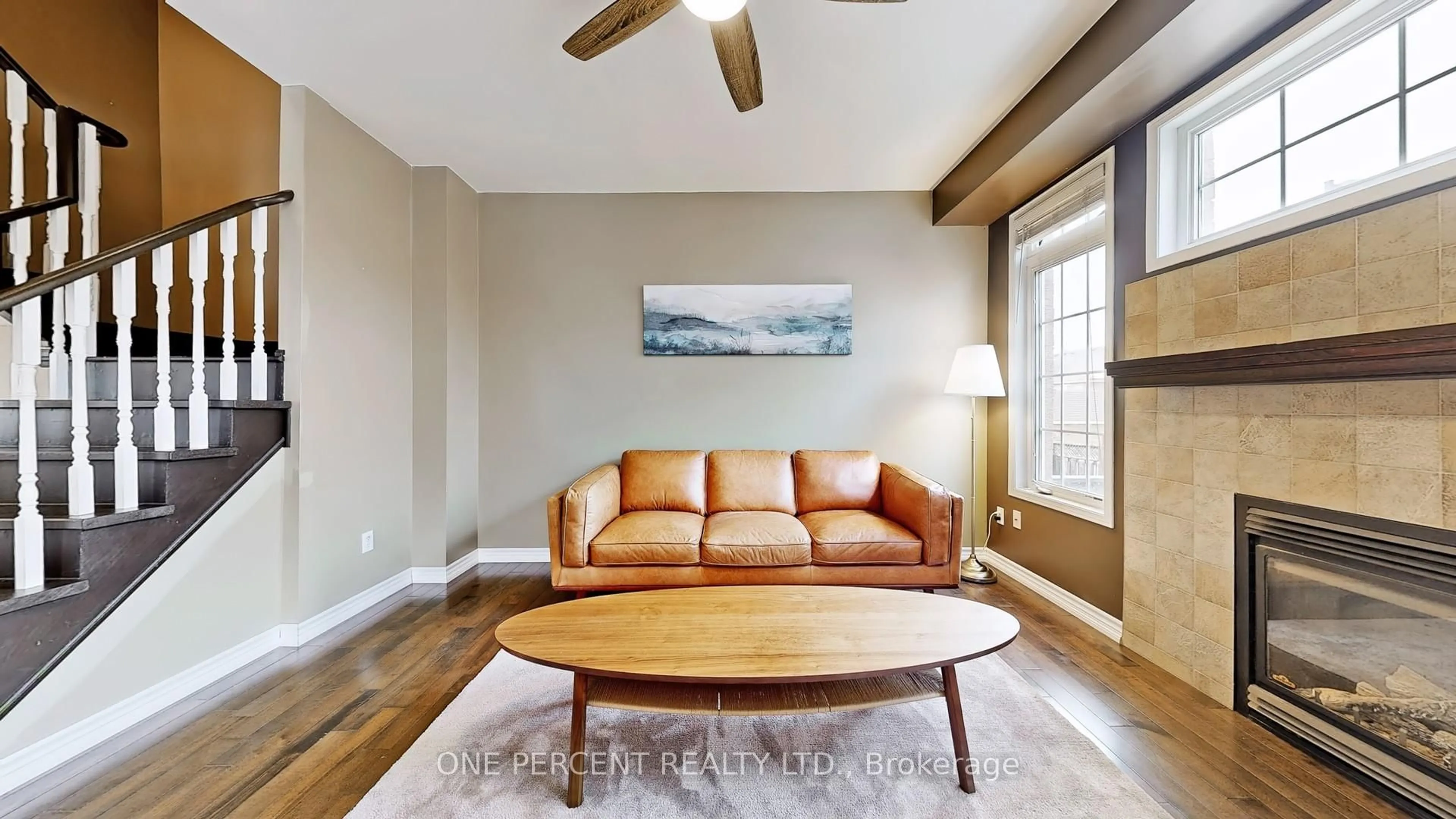 Living room with furniture, wood/laminate floor for 662 Shoal Point Rd, Ajax Ontario L1S 7P2