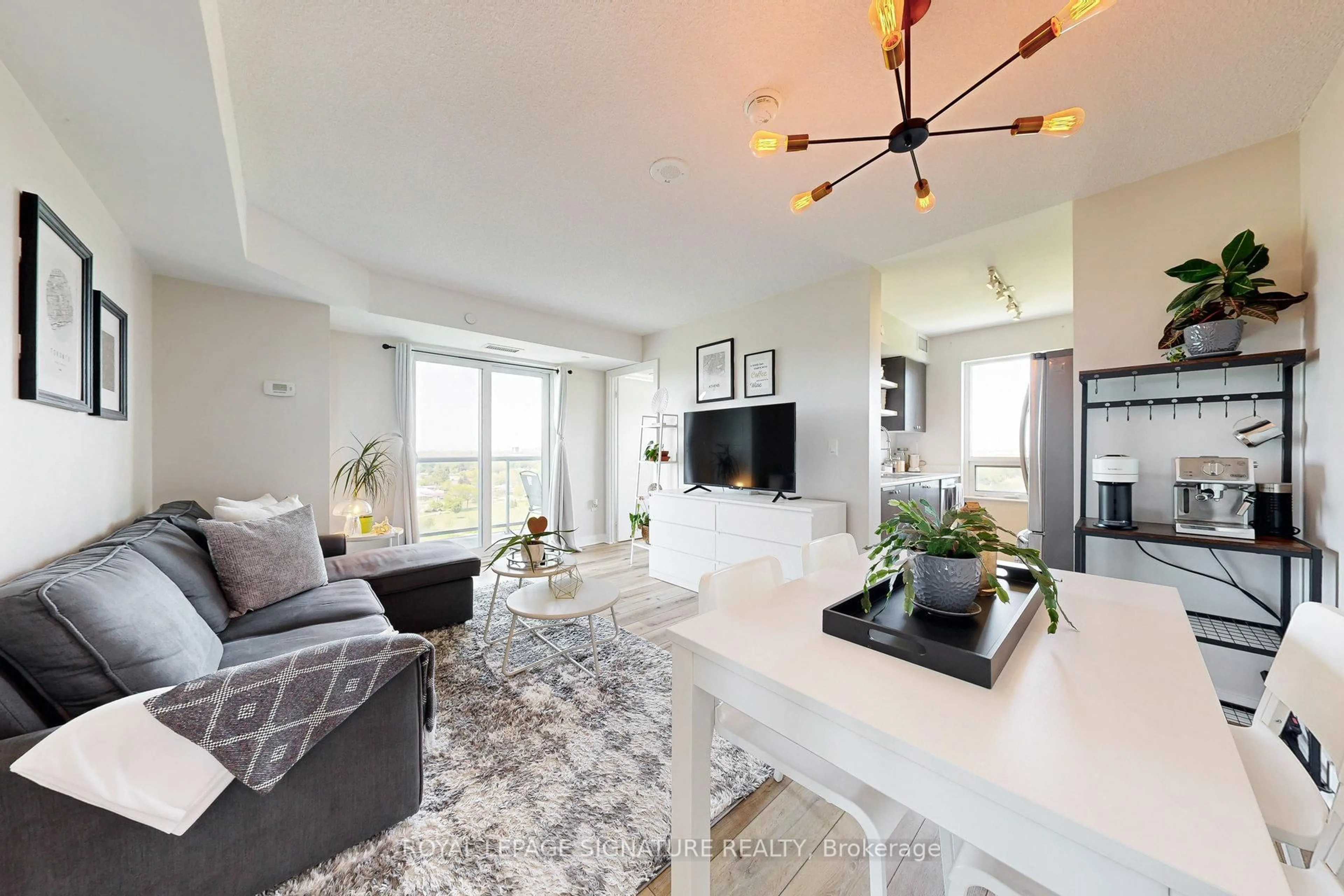 Living room with furniture, unknown for 1346 Danforth Rd #1312, Toronto Ontario M1J 0A9