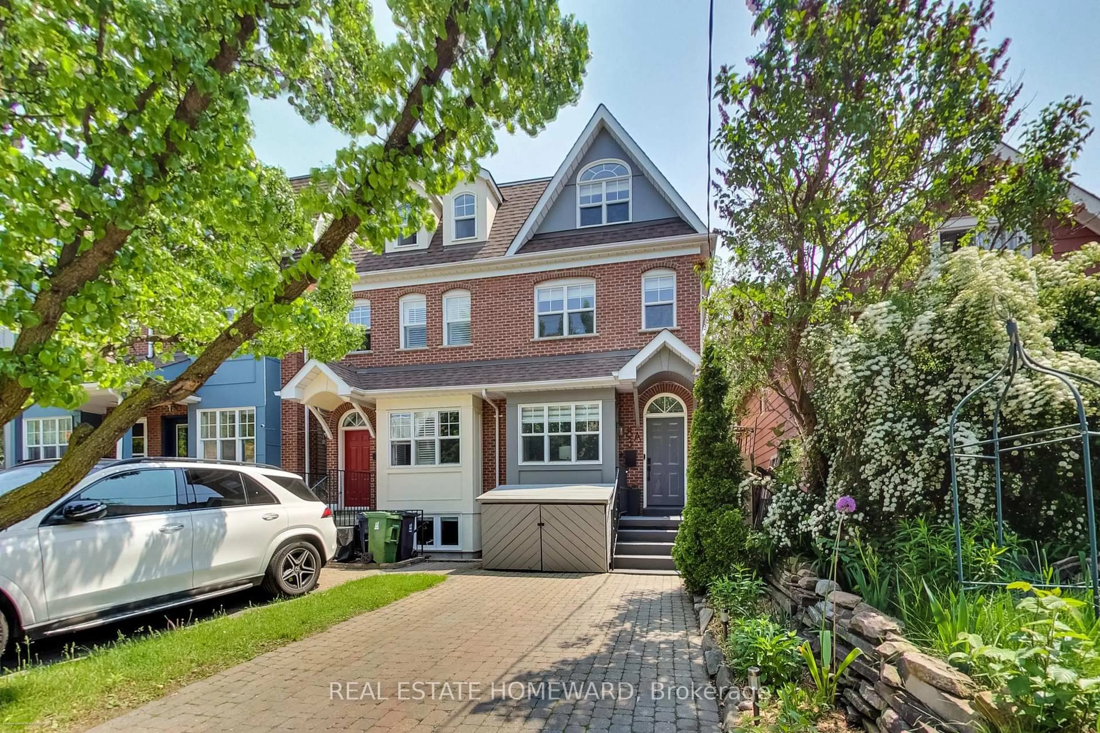 Home with brick exterior material, street for 83A Swanwick Ave, Toronto Ontario M4E 1Z6