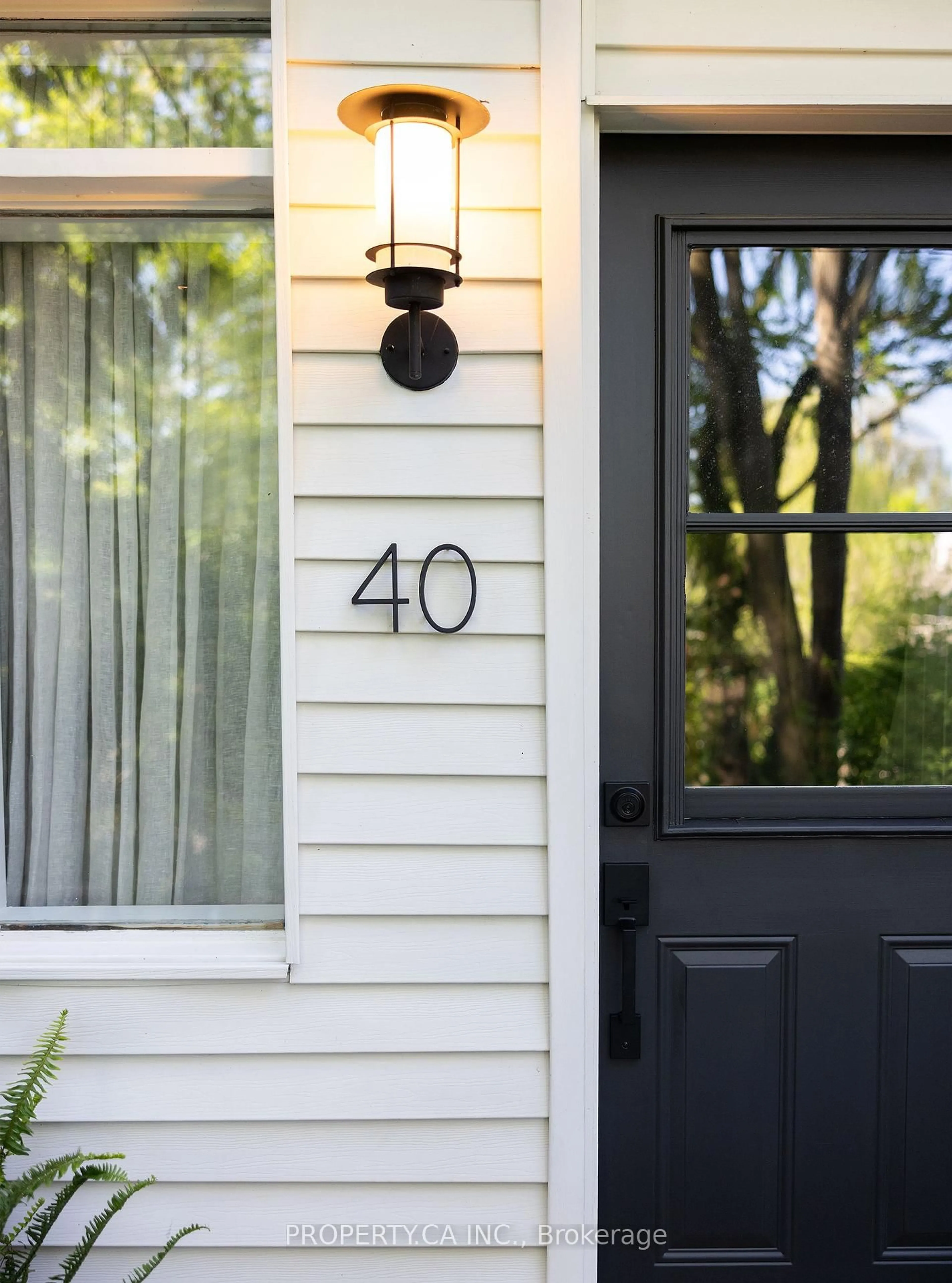Home with vinyl exterior material, street for 40 Ivy Ave, Toronto Ontario M4L 2H7