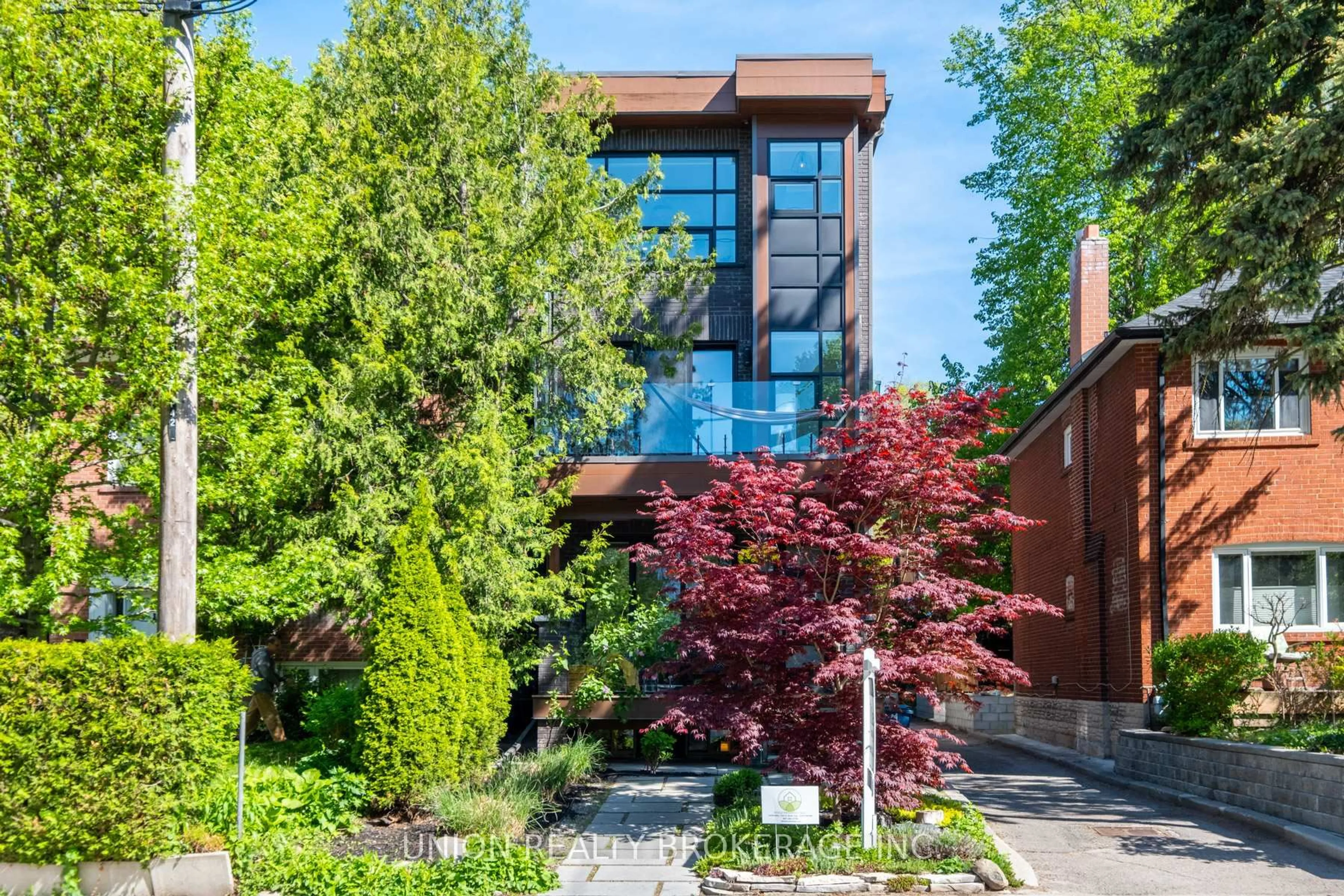 Home with brick exterior material, street for 46 Harriet St, Toronto Ontario M4L 2E9