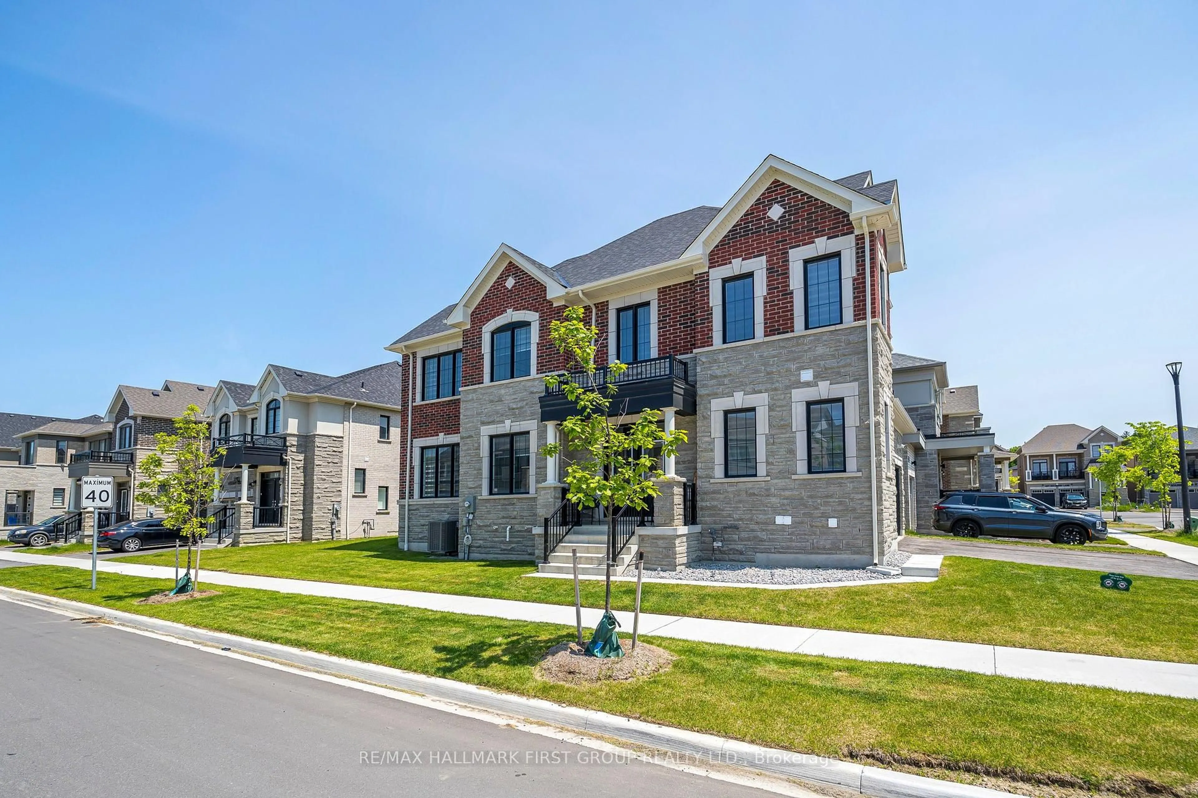 Home with brick exterior material, street for 1492 Hawktail Path, Pickering Ontario L1X 0N9