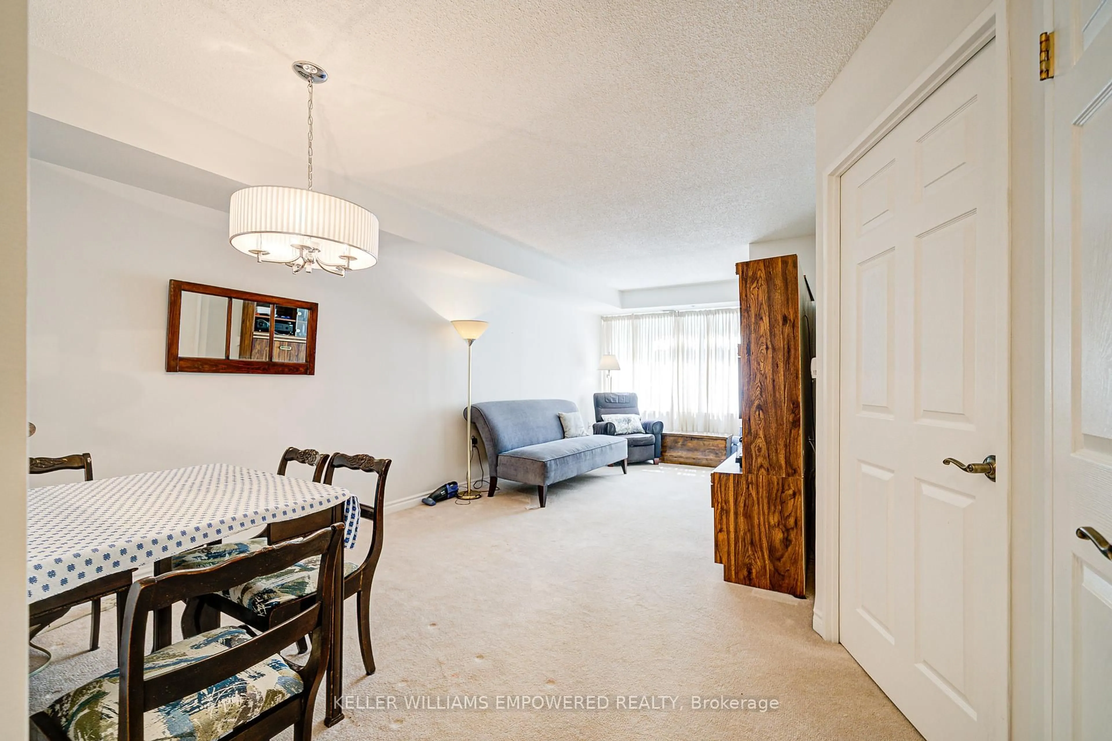 Living room with furniture, unknown for 115 Bonis Ave #410, Toronto Ontario M1T 3S4