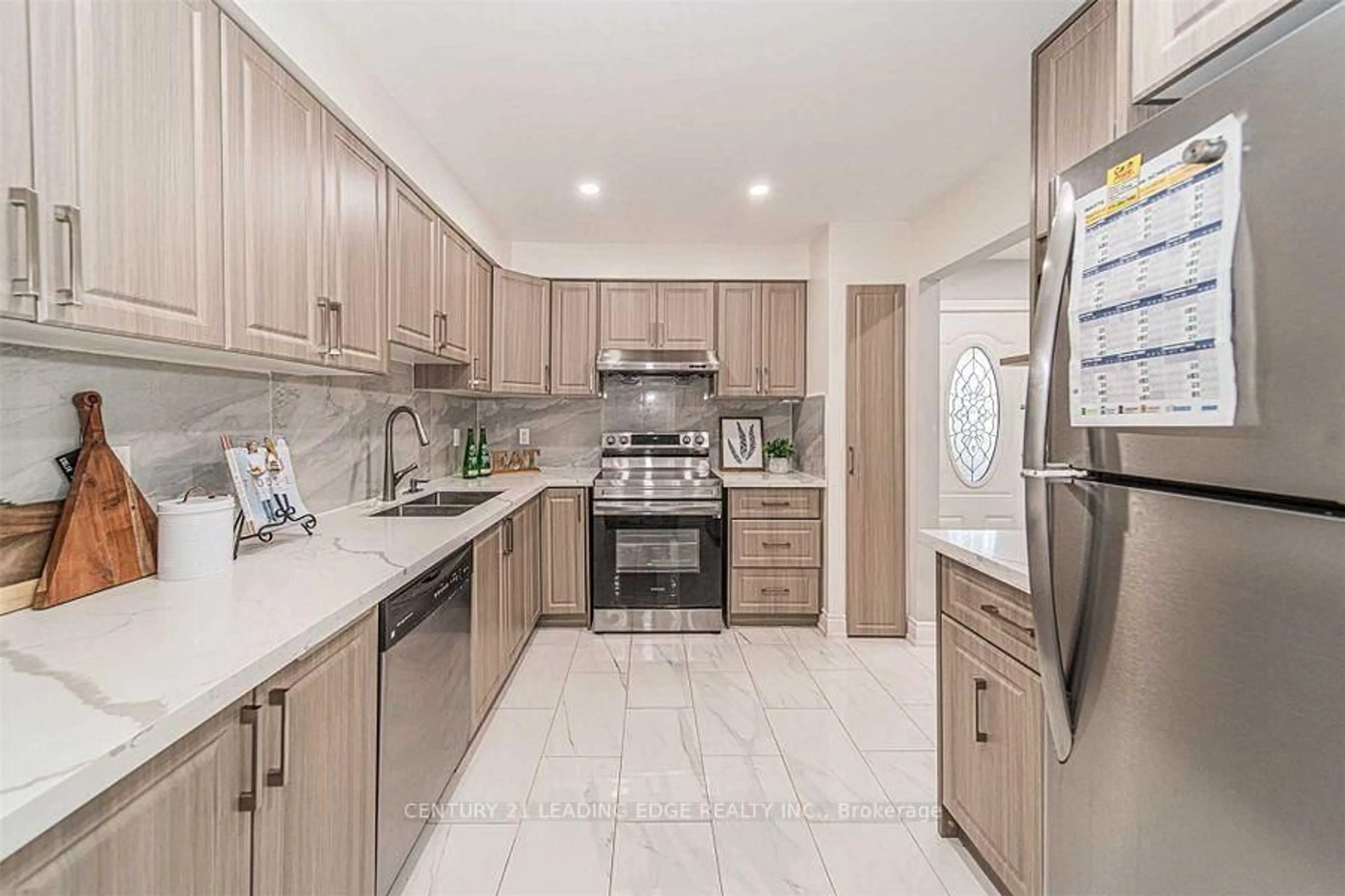 Open concept kitchen, ceramic/tile floor for 18 Tambrook Dr, Toronto Ontario M1W 3L9