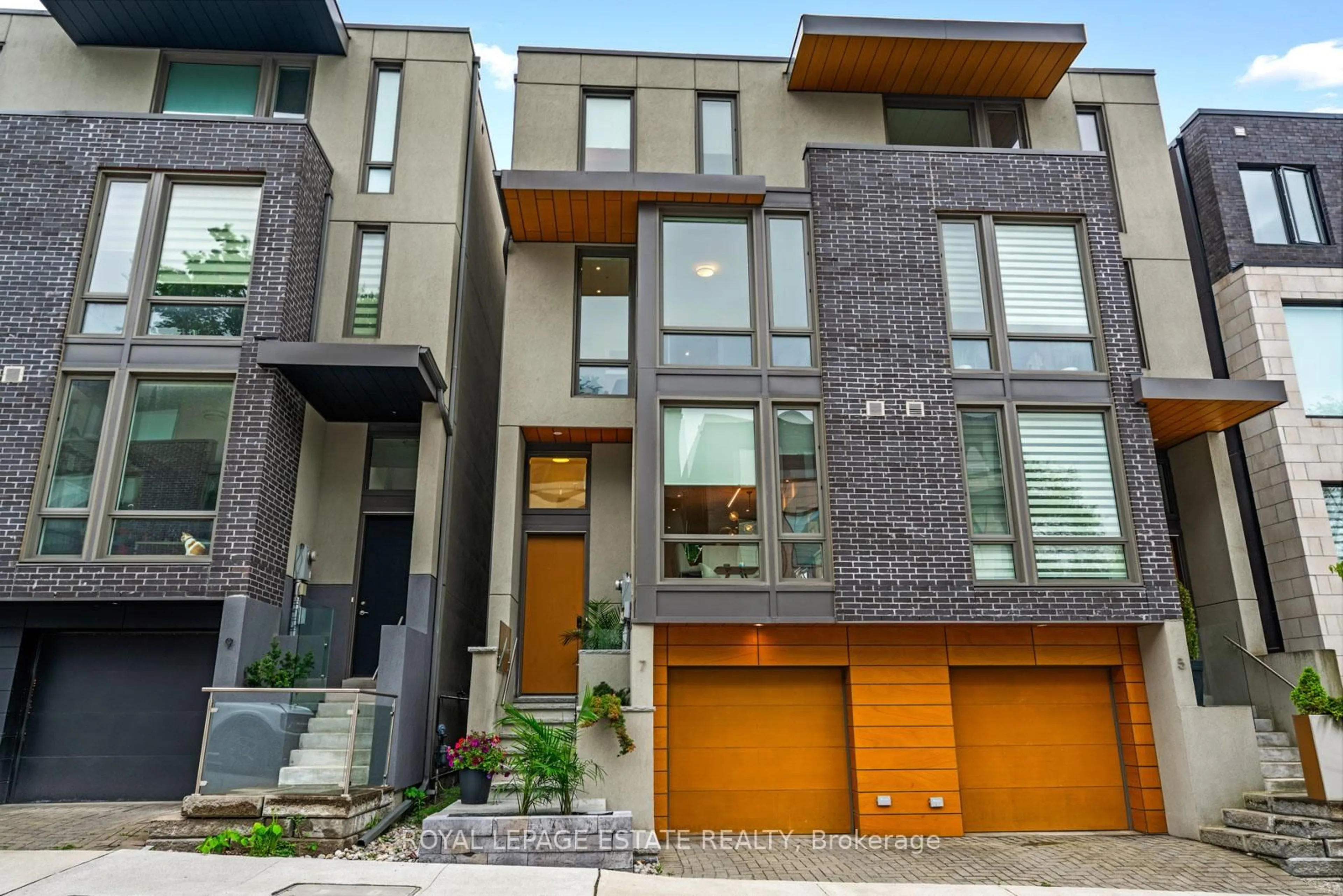 Home with brick exterior material, street for 7 Vince Ave, Toronto Ontario M4L 0A6