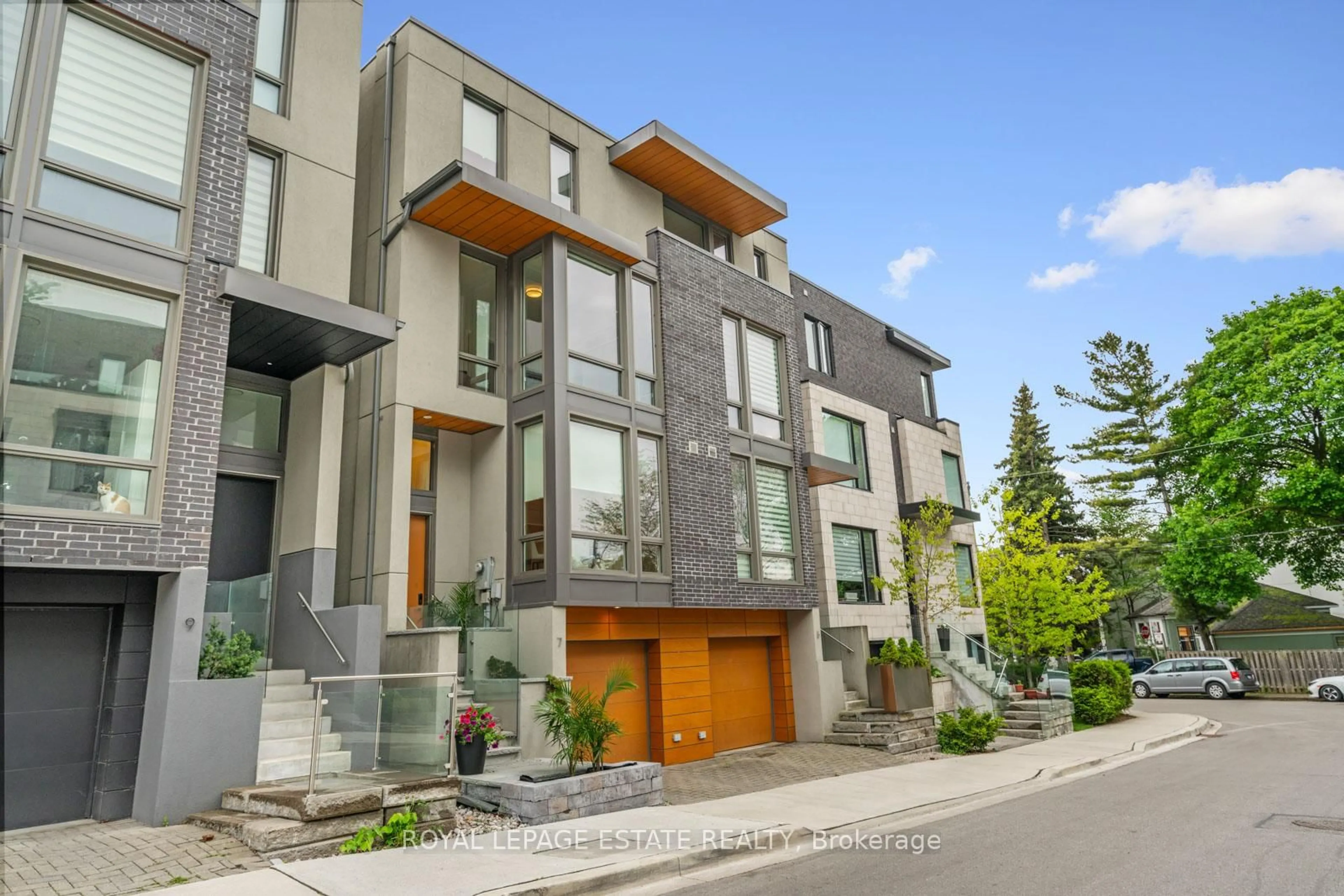 Home with brick exterior material, street for 7 Vince Ave, Toronto Ontario M4L 0A6