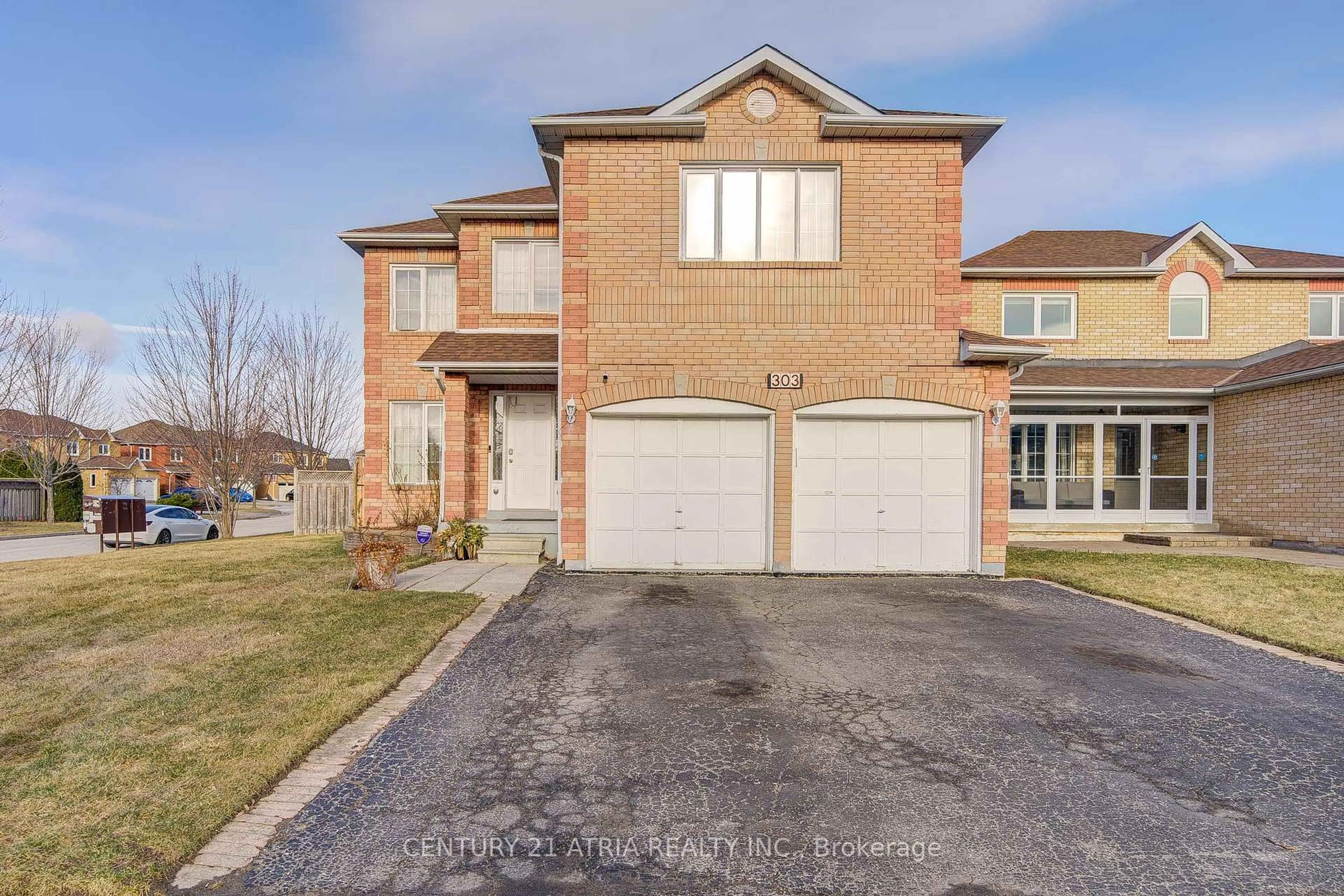 Home with brick exterior material, street for 303 Delaney Dr, Ajax Ontario L1T 3S6