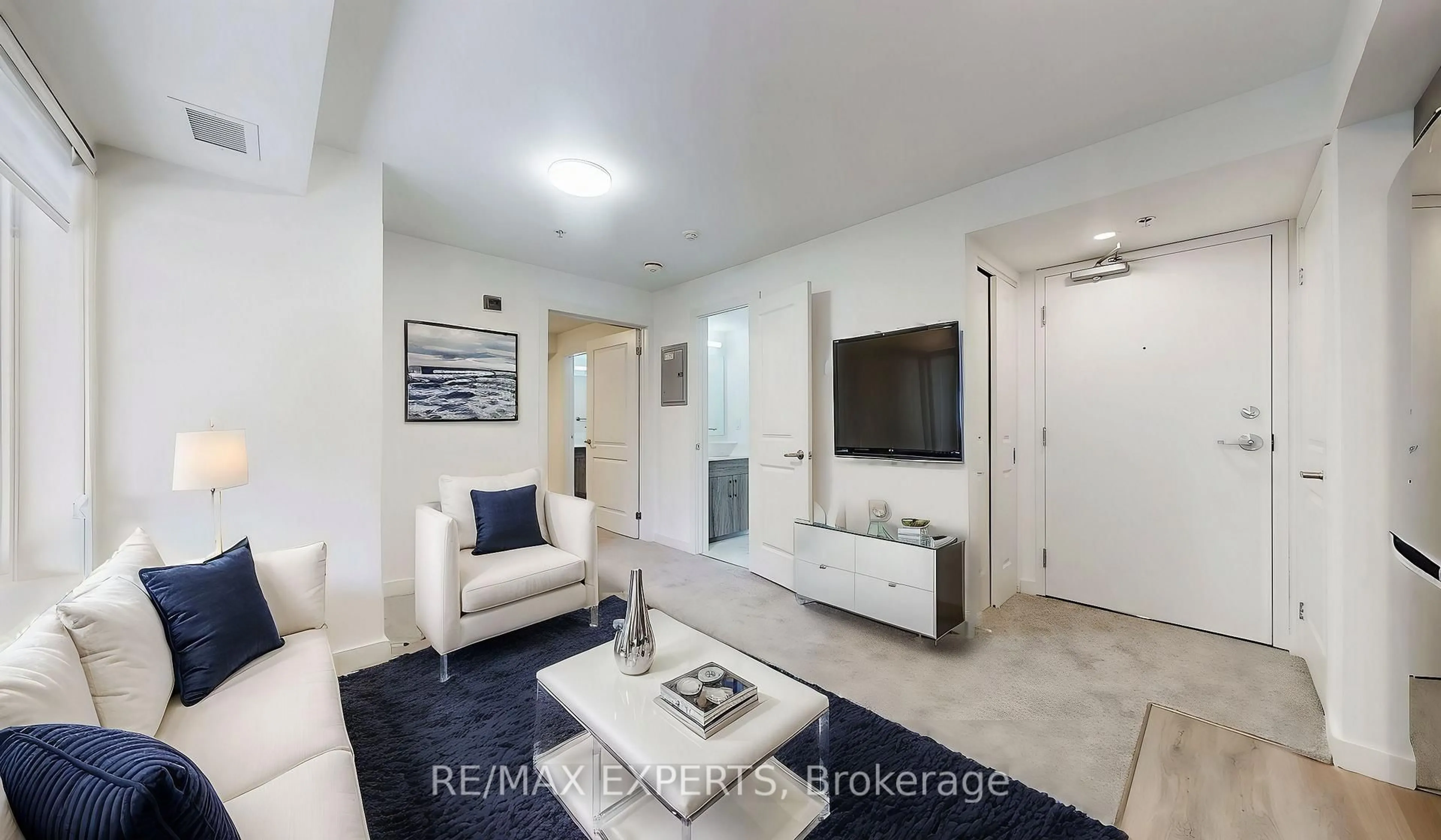 Living room with furniture, unknown for 45 Connaught Ave #102, Toronto Ontario M4L 2V8