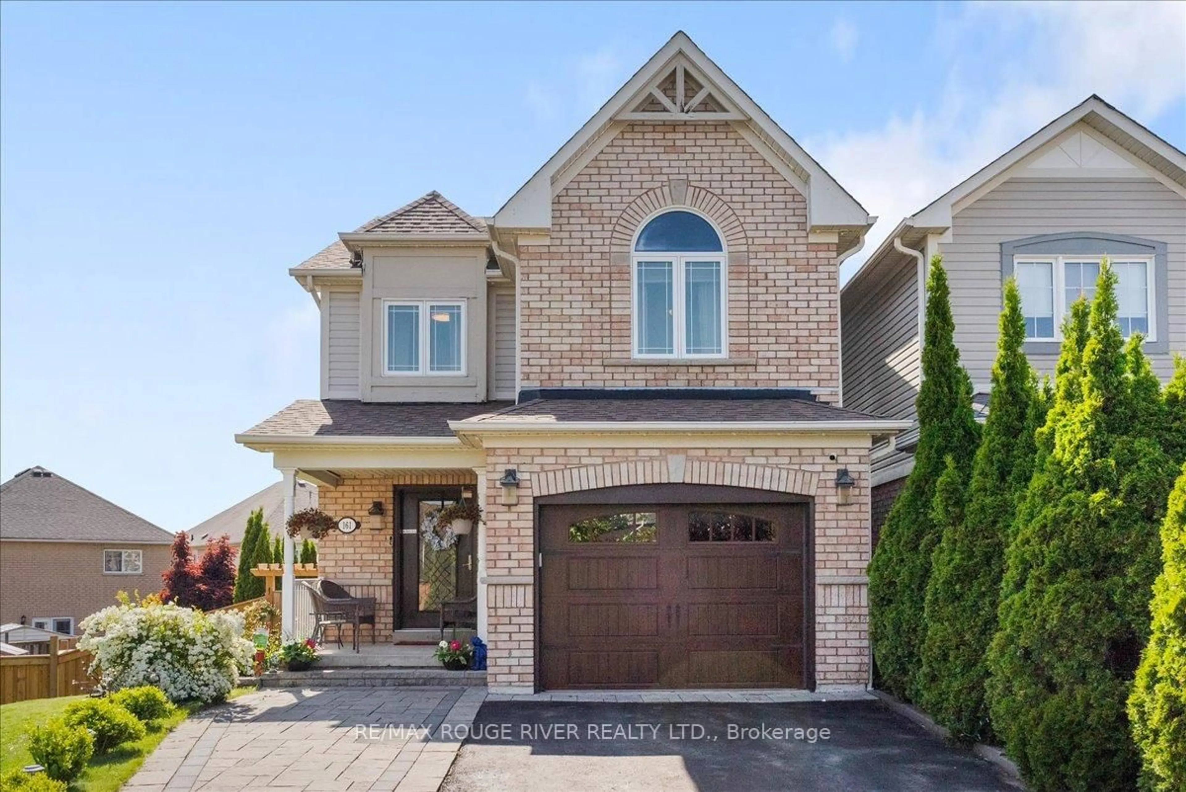 Home with brick exterior material, street for 161 Kirkland Pl, Whitby Ontario L1P 1X2