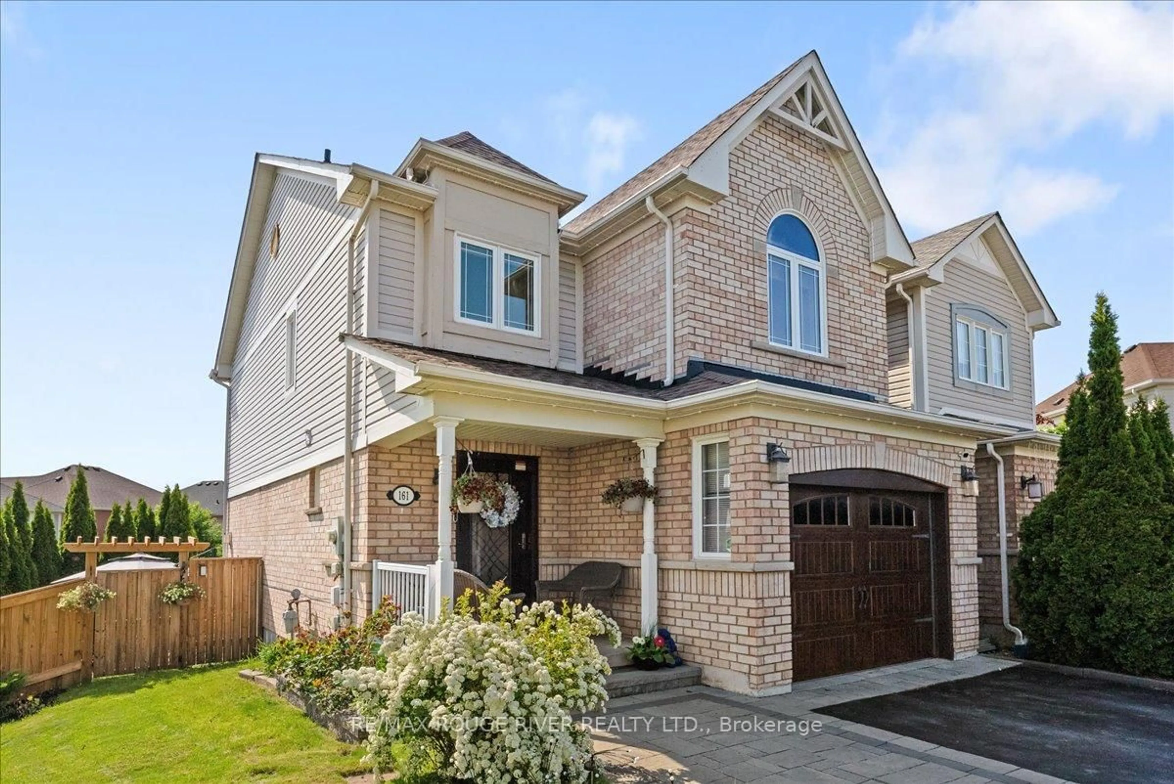 Home with brick exterior material, street for 161 Kirkland Pl, Whitby Ontario L1P 1X2