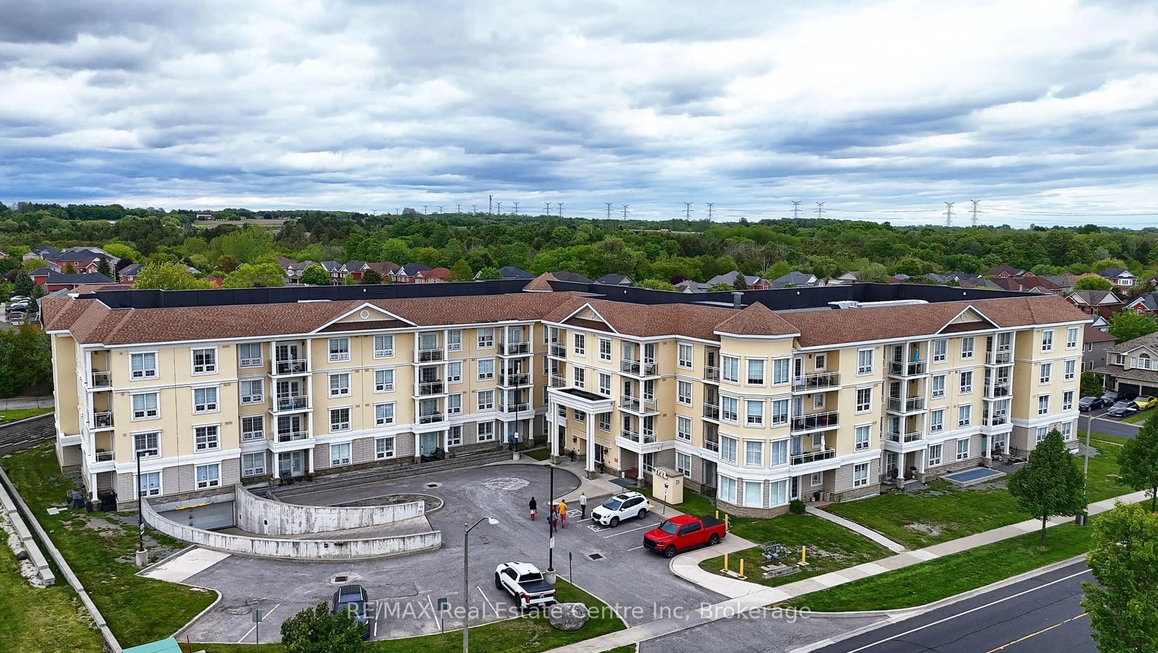 A pic from outside/outdoor area/front of a property/back of a property/a pic from drone, building for 21 BROOKHOUSE Dr #217, Clarington Ontario L1B 0V4