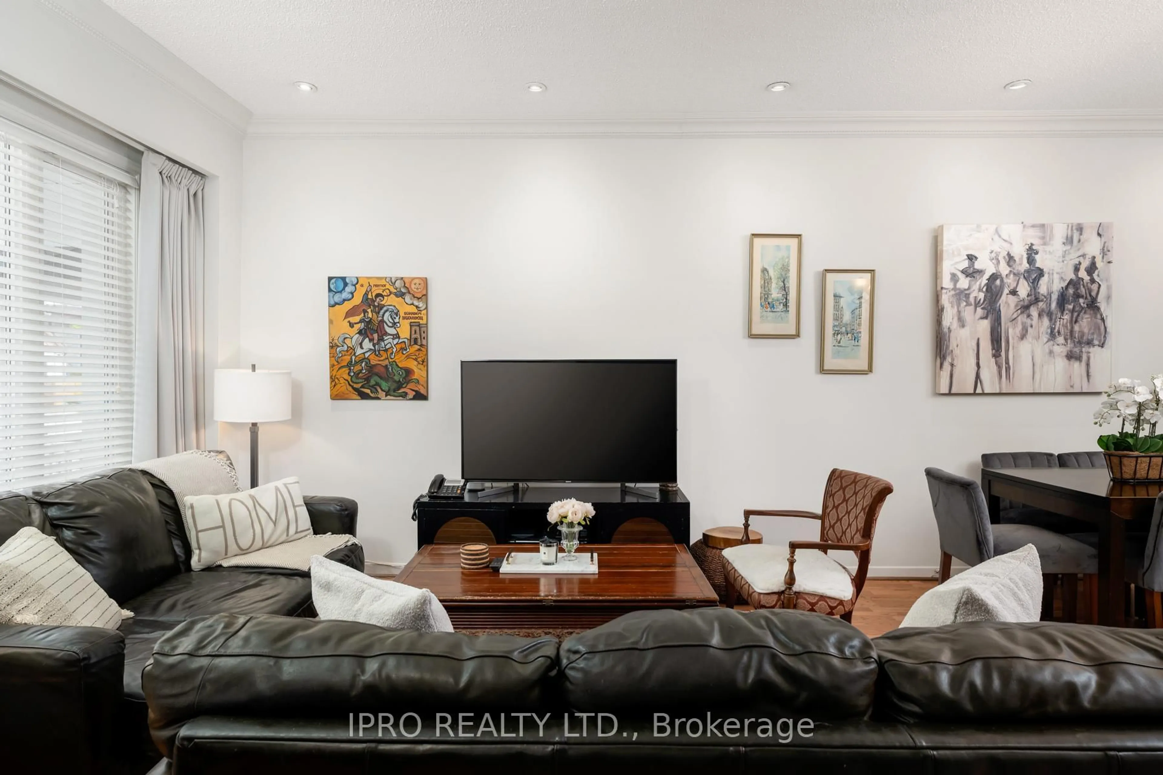 Living room with furniture, wood/laminate floor for 241 Gowan Ave, Toronto Ontario M4J 2K7
