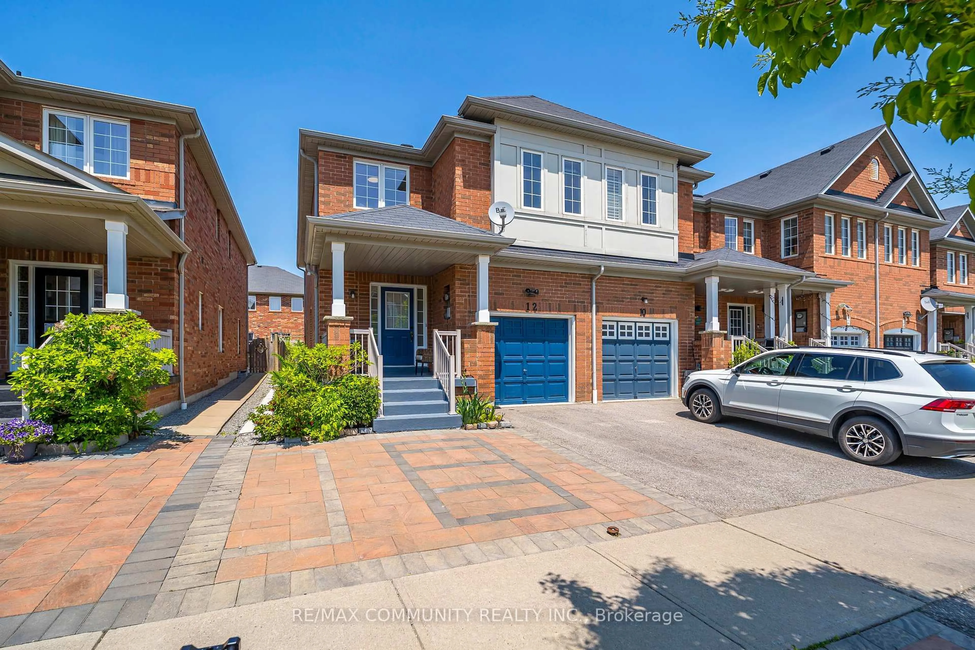 Home with brick exterior material, street for 12 Hickman Rd, Ajax Ontario L1S 0C8