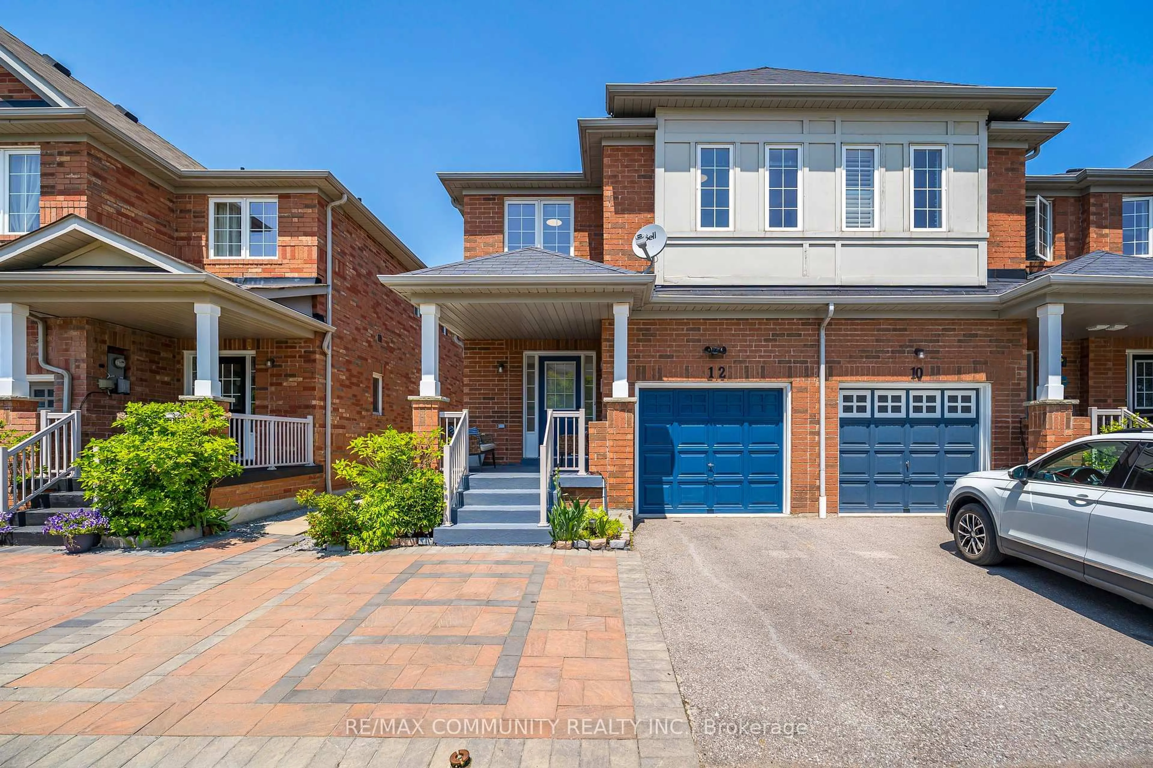 Home with brick exterior material, street for 12 Hickman Rd, Ajax Ontario L1S 0C8