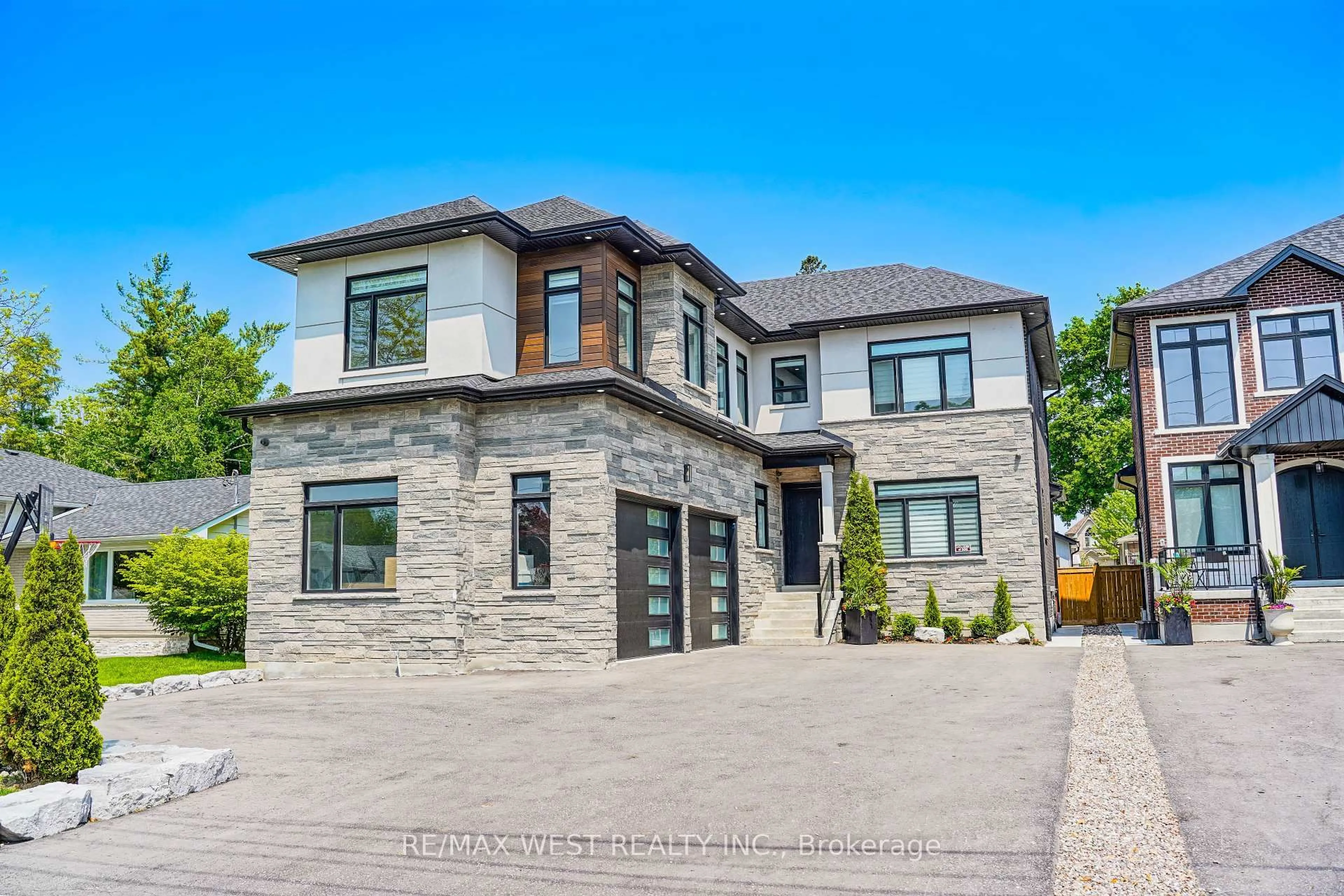 Home with brick exterior material, street for 407 Cochrane St, Whitby Ontario L1N 5J6