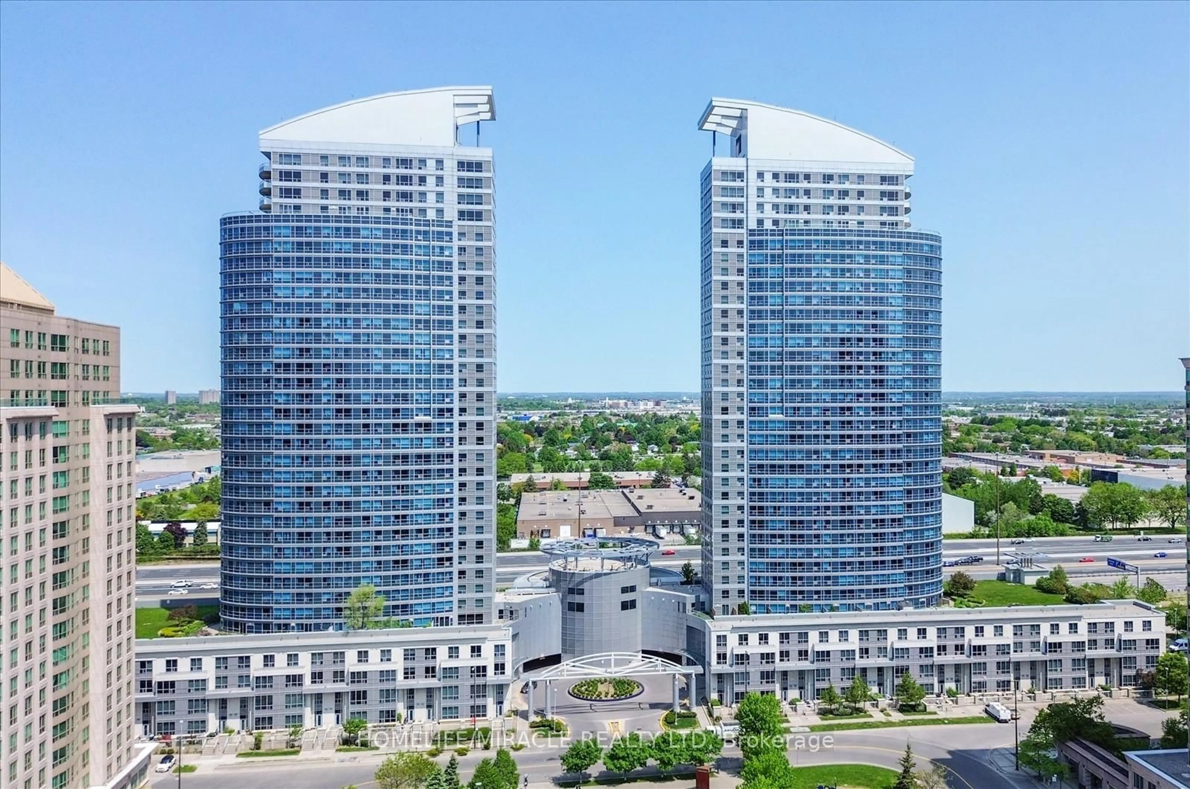 A pic from outside/outdoor area/front of a property/back of a property/a pic from drone, city buildings view from balcony for 38 Lee Centre Dr #712, Toronto Ontario M1H 3J7